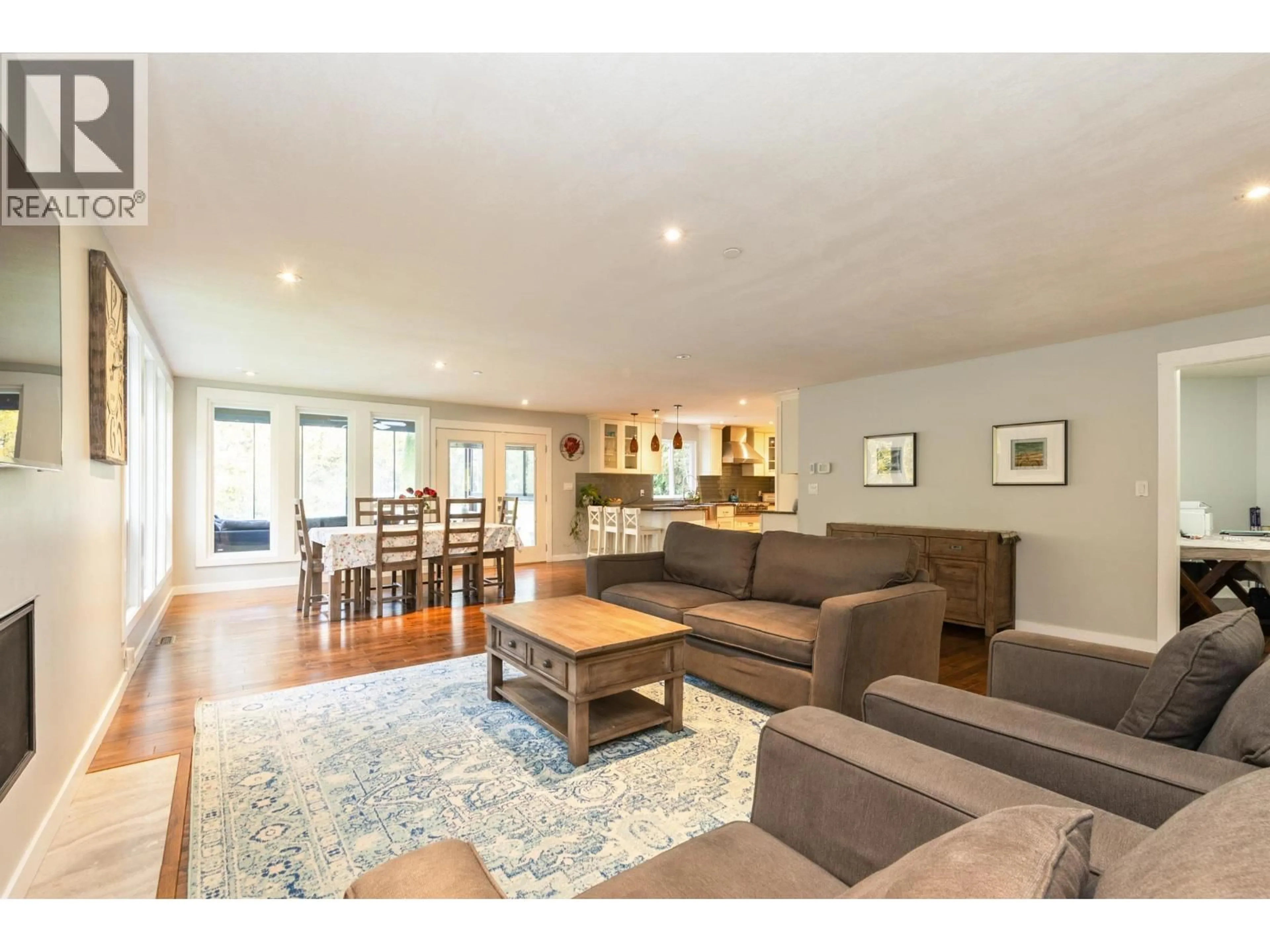 Living room with furniture, wood/laminate floor for 24445 104 AVENUE, Maple Ridge British Columbia V2W1J2