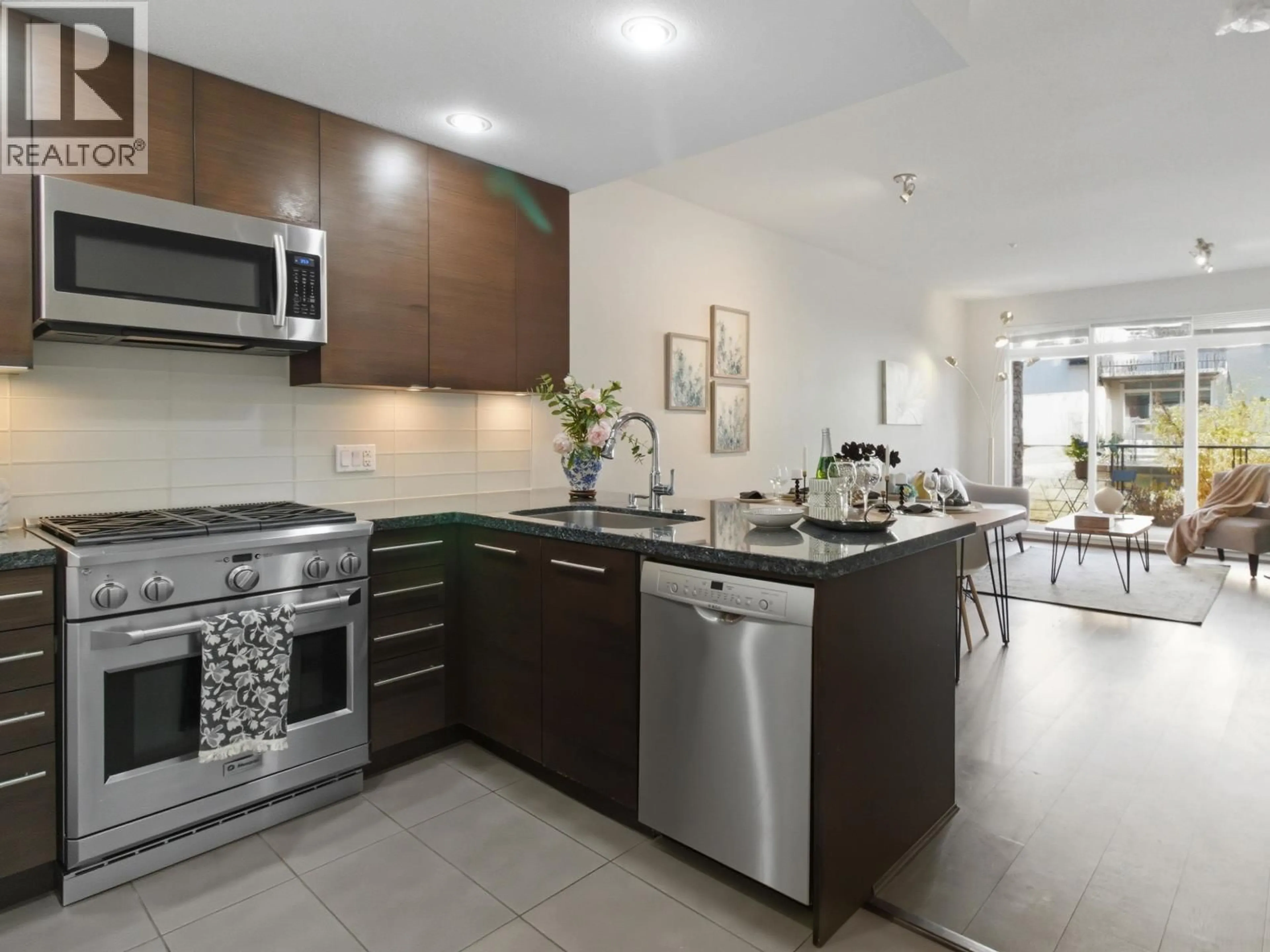 Open concept kitchen, ceramic/tile floor for 303 - 5928 BIRNEY AVENUE, Vancouver British Columbia V6S0B5