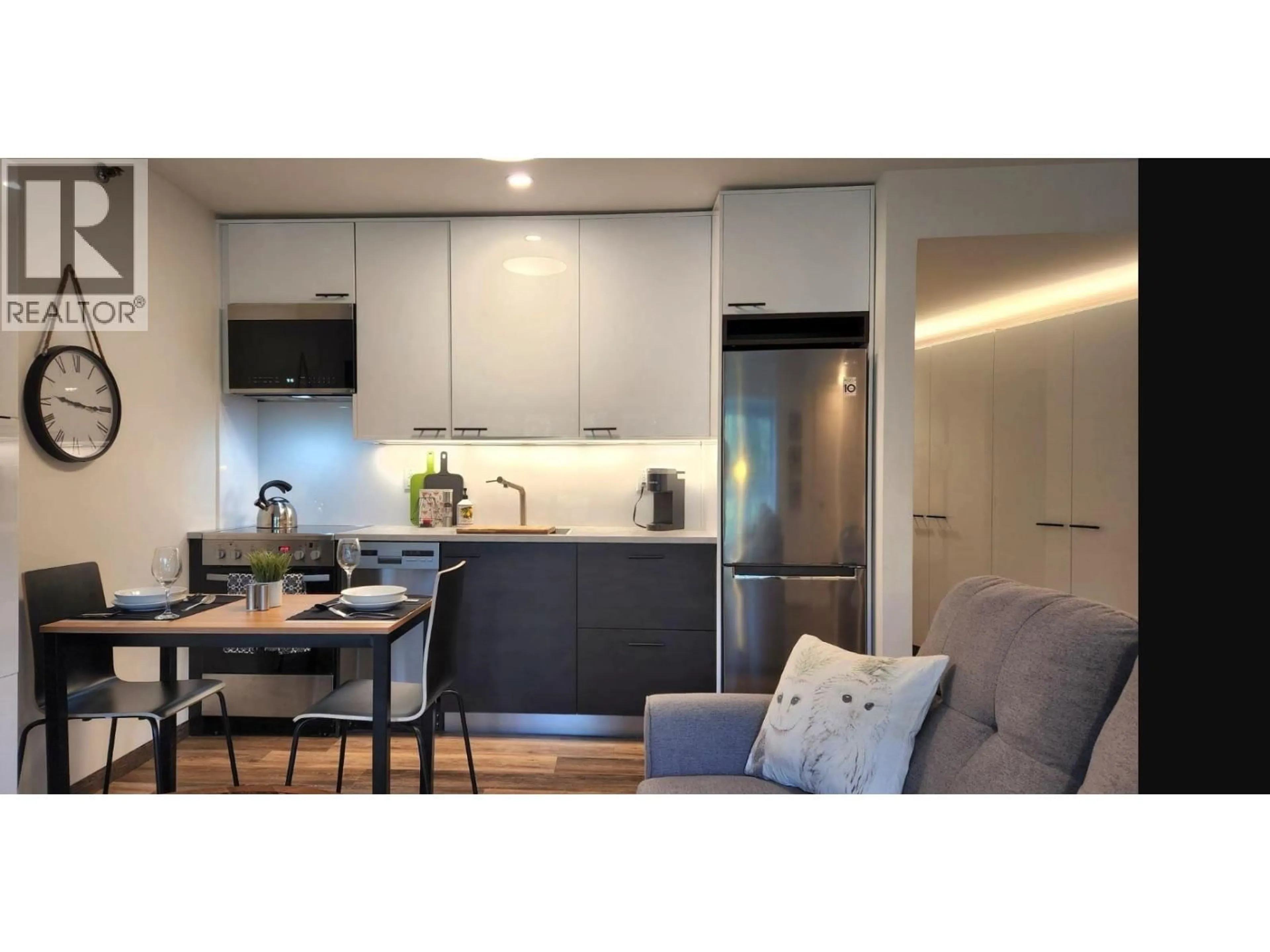 Open concept kitchen, wood/laminate floor for 207 - 2111 WHISTLER ROAD, Whistler British Columbia V0N1B2