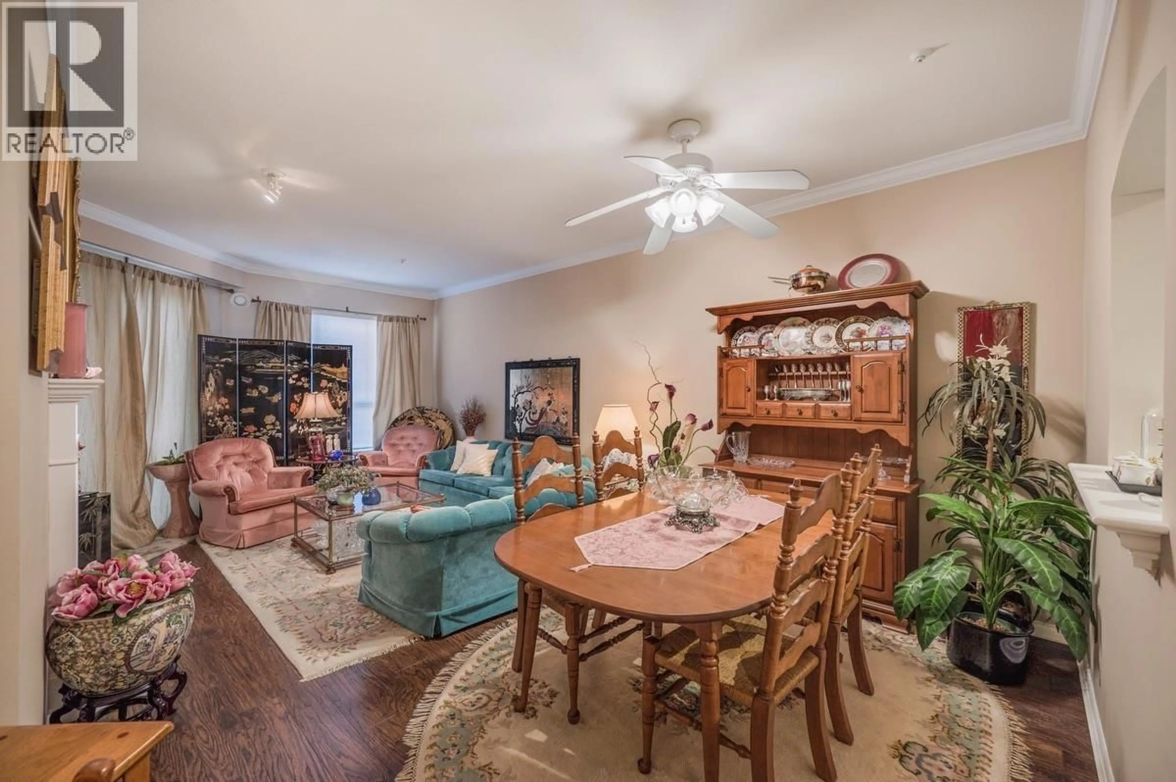 Living room with furniture, wood/laminate floor for 320 - 3098 GUILDFORD WAY, Coquitlam British Columbia V3B7W8