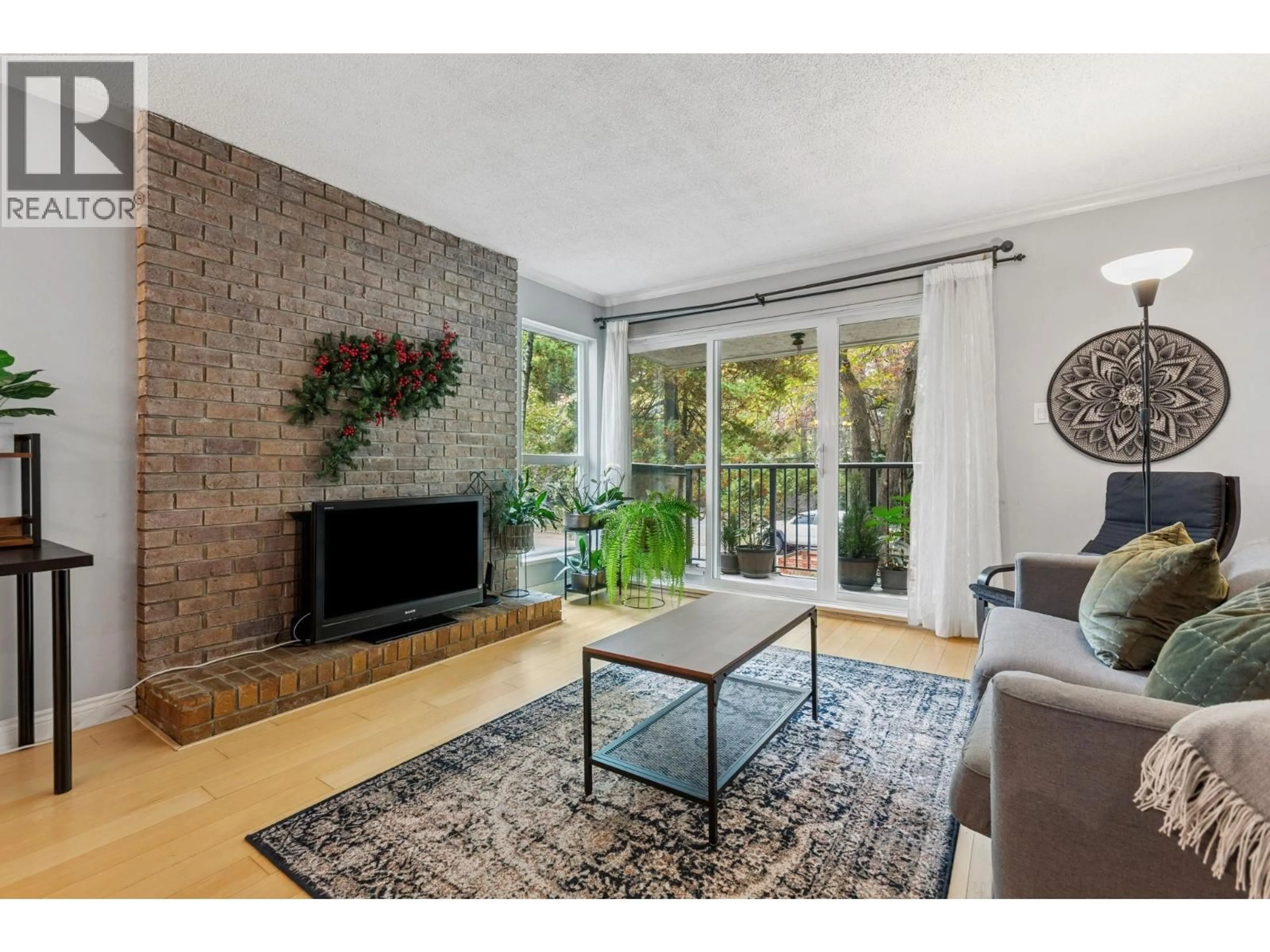 Living room with furniture, unknown for 204 - 1234 PENDRELL STREET, Vancouver British Columbia V6E1L6