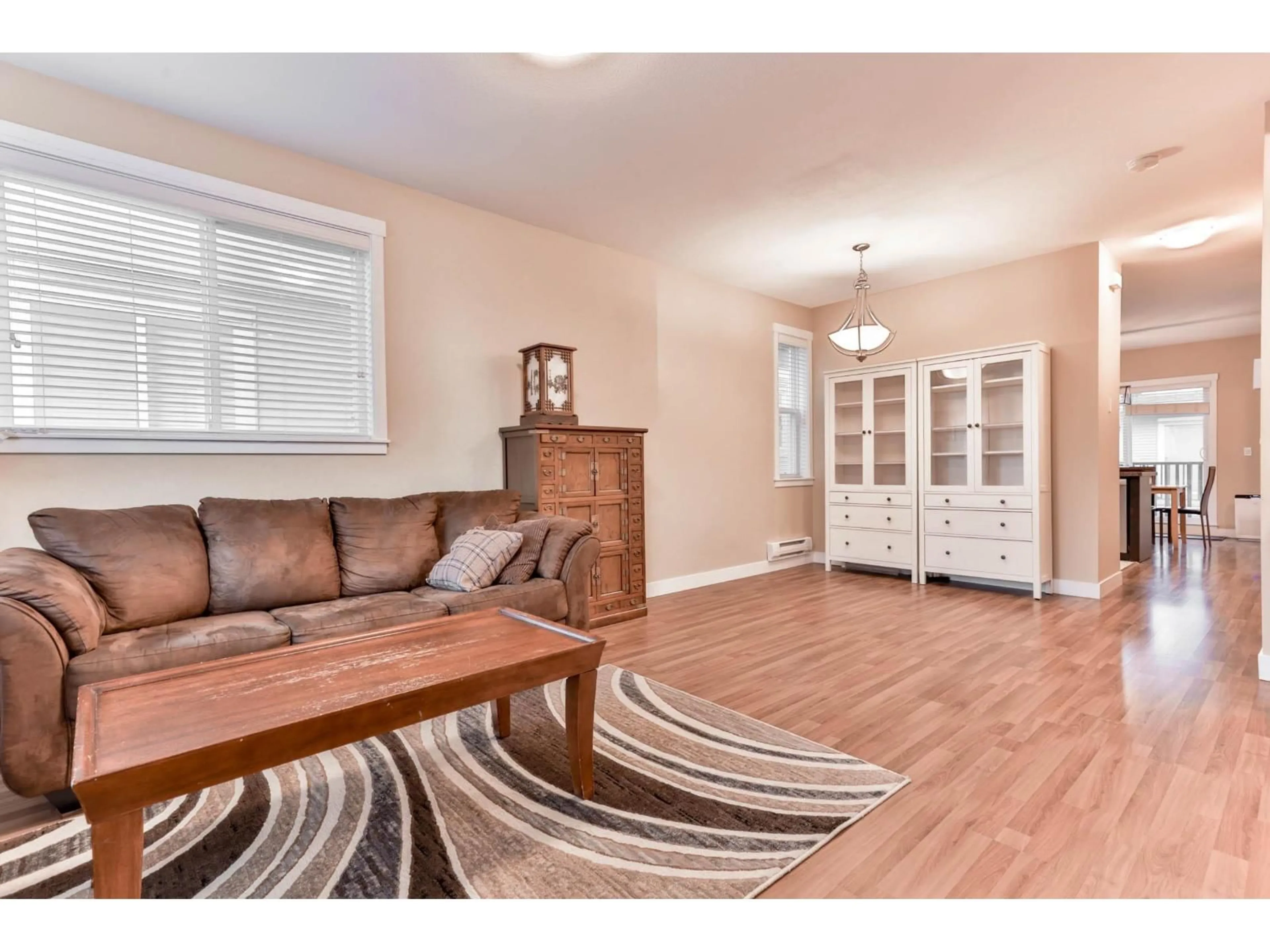 Living room with furniture, wood/laminate floor for 42 - 8676 158 STREET, Surrey British Columbia V4N5W3