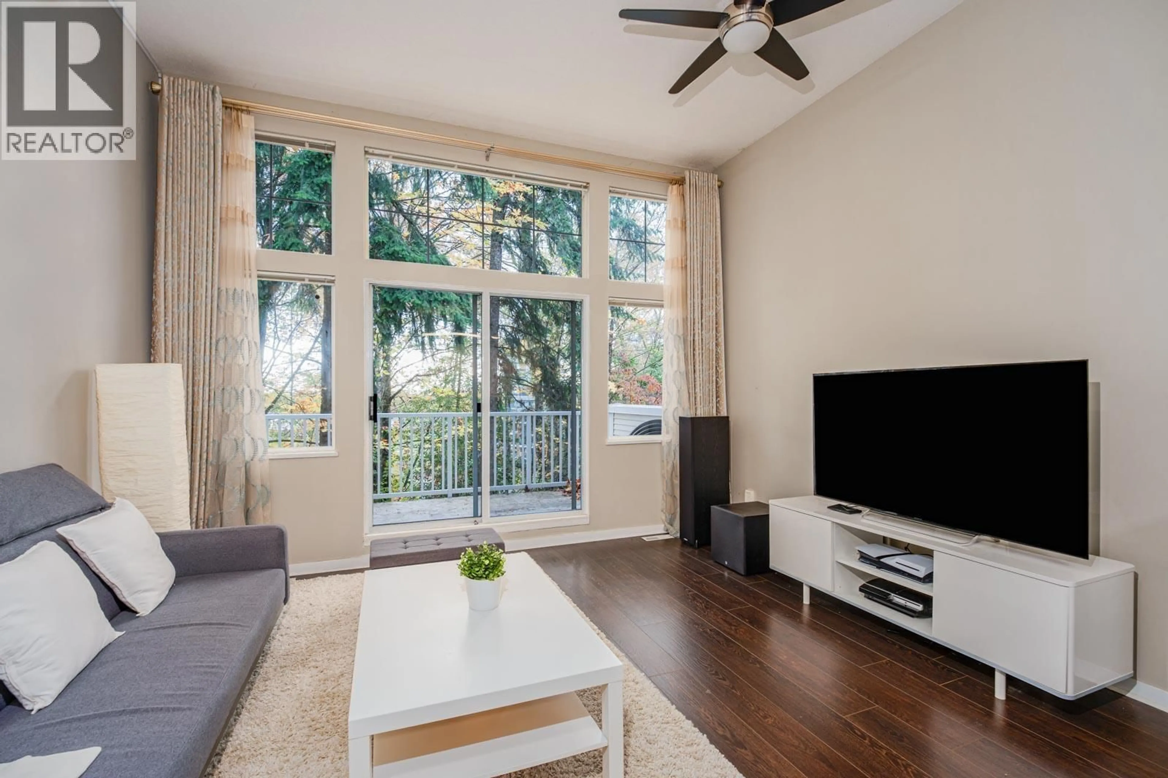 Living room with furniture, wood/laminate floor for 1 - 3586 RAINIER PLACE, Vancouver British Columbia V5S4T3