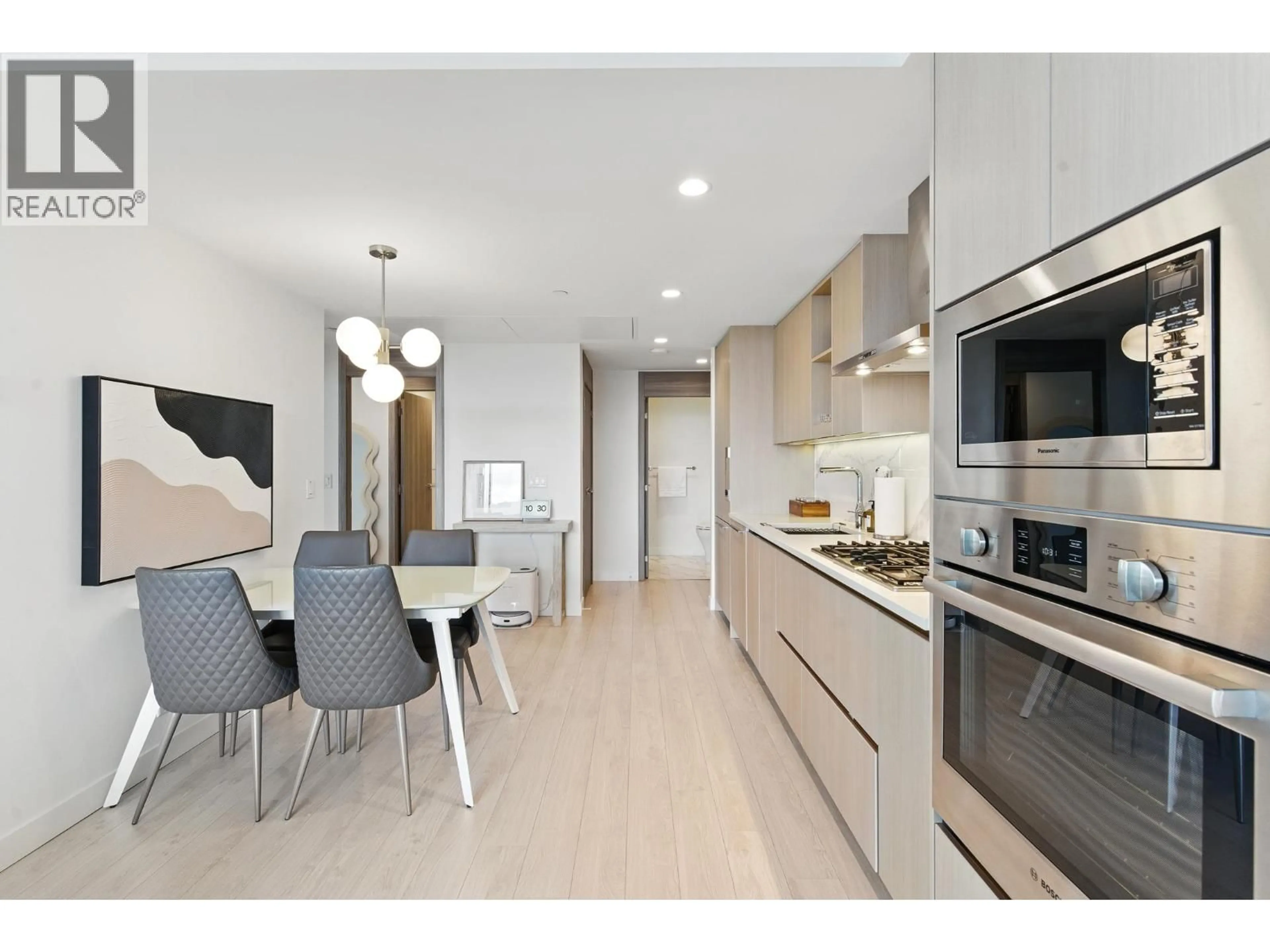 Open concept kitchen, wood/laminate floor for 2007 - 4880 LOUGHEED HIGHWAY, Burnaby British Columbia V5C0N1