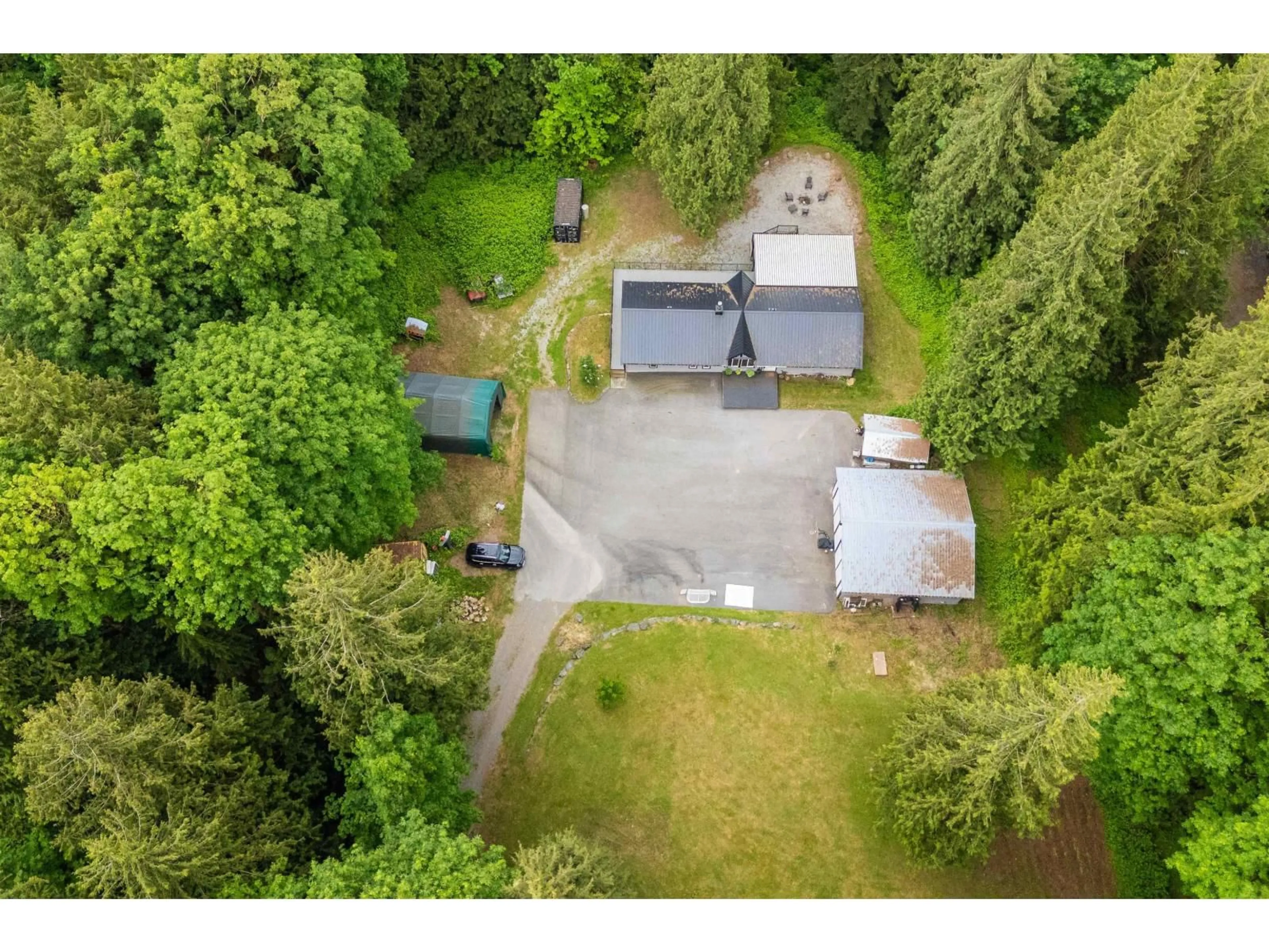 A pic from outside/outdoor area/front of a property/back of a property/a pic from drone, forest/trees view for 31648 GROVE, Mission British Columbia V4S1E6