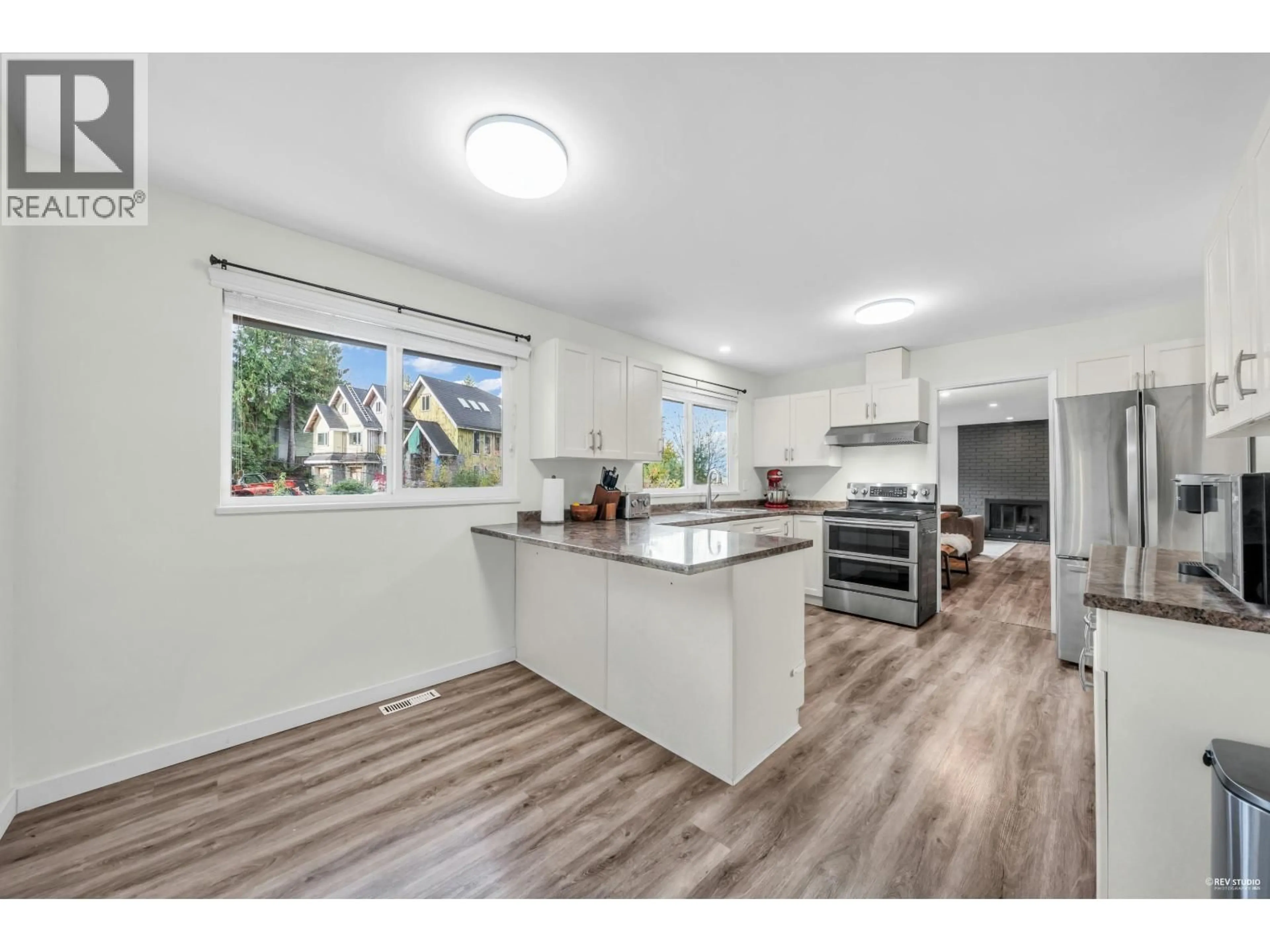 Open concept kitchen, wood/laminate floor for 2247 PARK CRESCENT, Coquitlam British Columbia V3J6T3