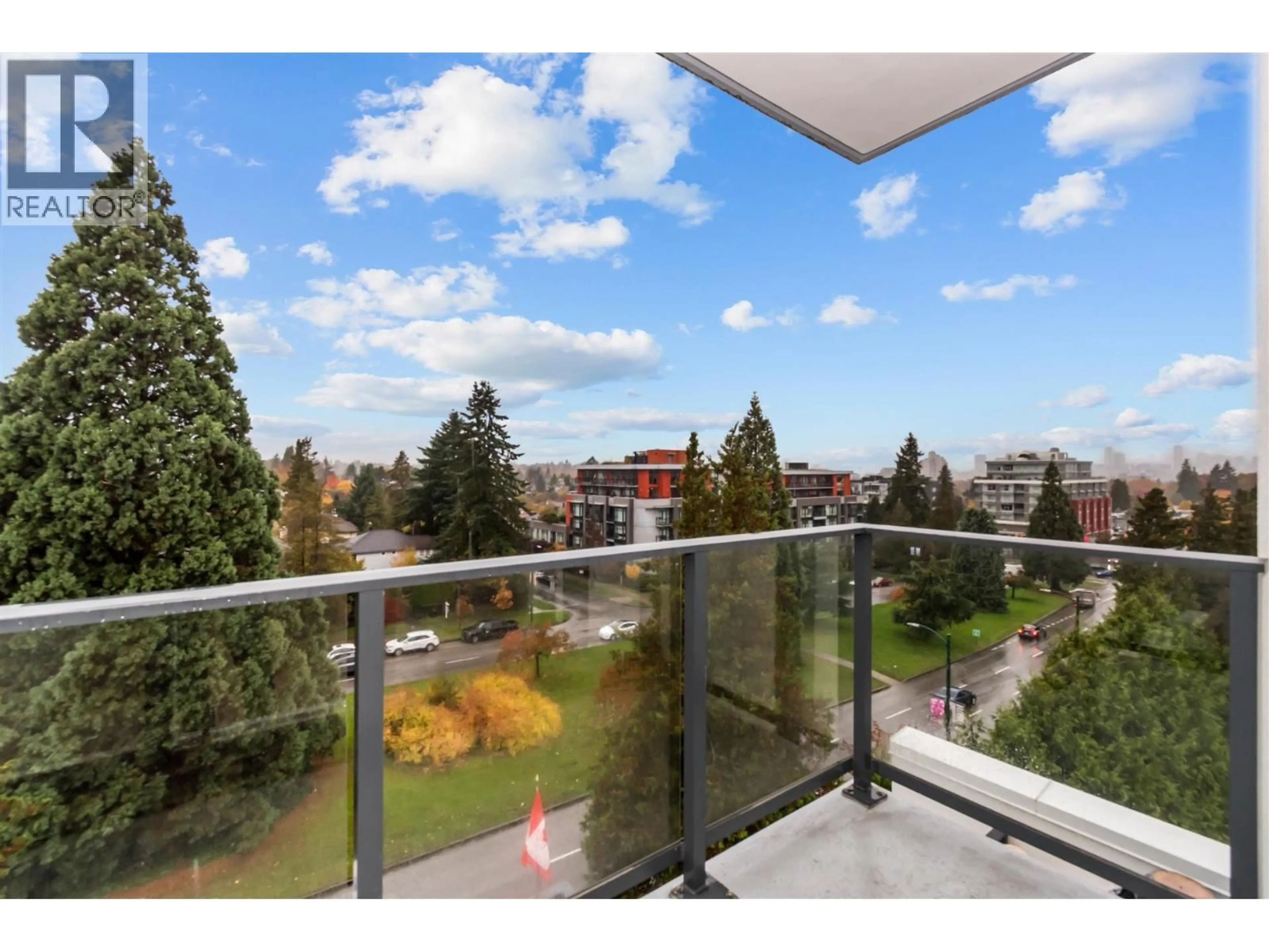 Balcony in the apartment, city buildings view from balcony for 601 - 4240 CAMBIE STREET, West Vancouver British Columbia V5Z0K6