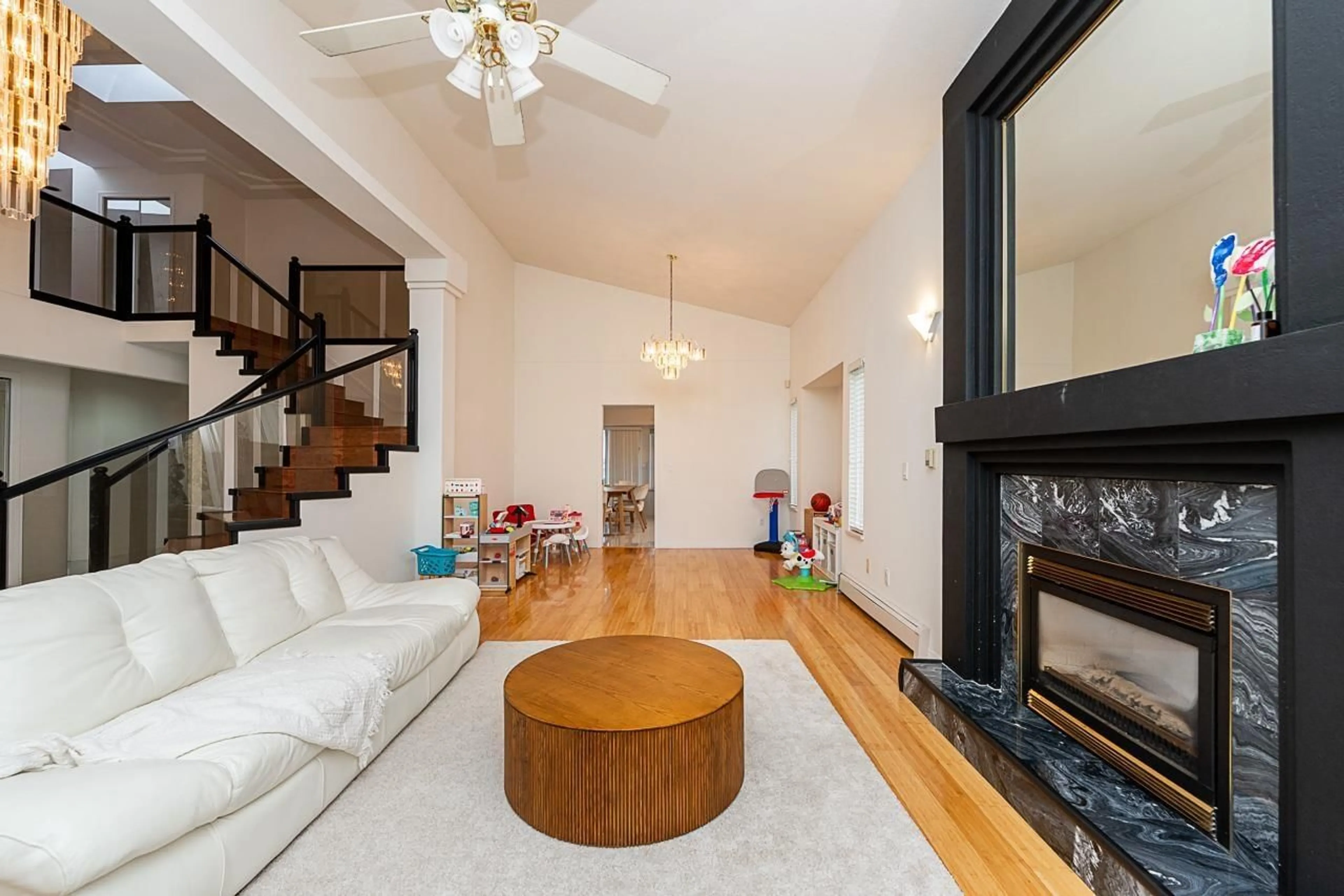 Living room with furniture, wood/laminate floor for 10132 156TH, Surrey British Columbia V3R4L5