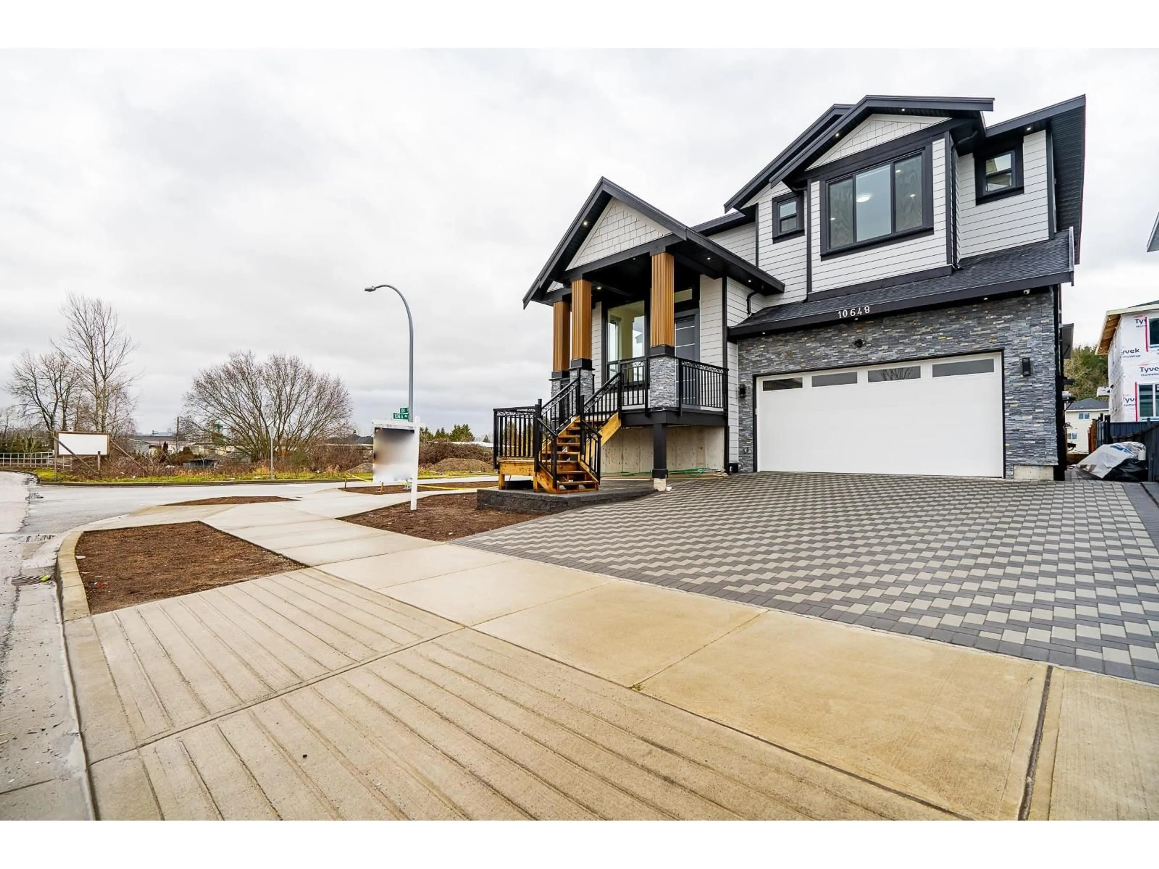 Home with brick exterior material, street for 10648 124, Surrey British Columbia V3V0E2