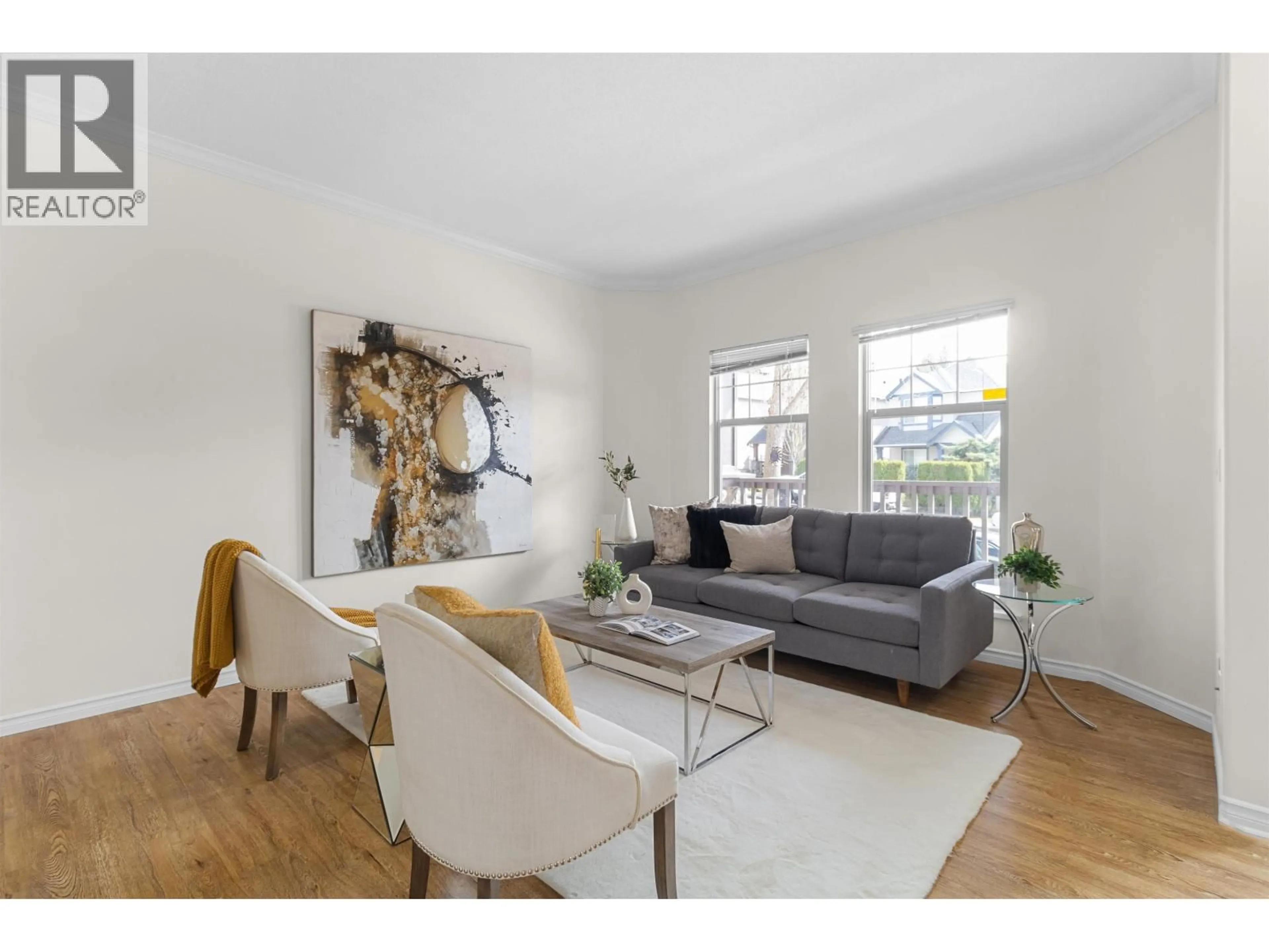 Living room with furniture, wood/laminate floor for 22783 116 AVENUE, Maple Ridge British Columbia V2X3N6