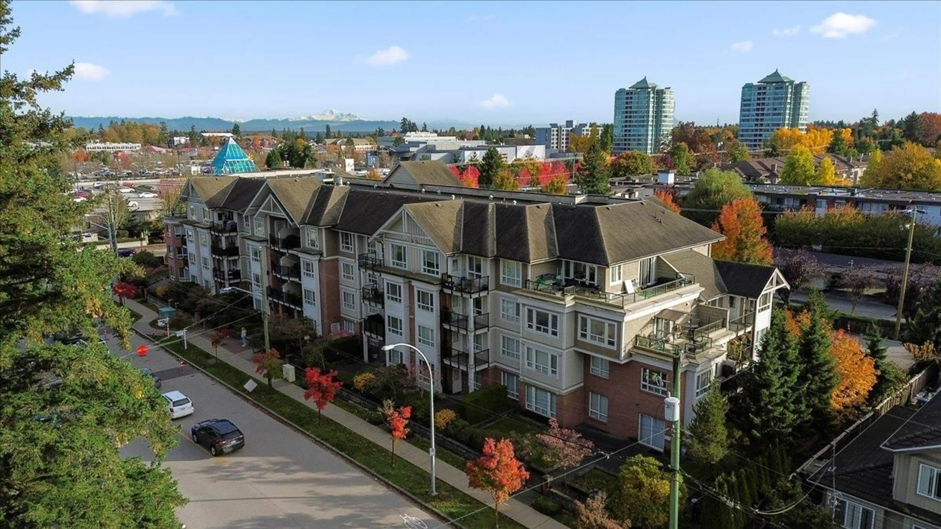 A pic from outside/outdoor area/front of a property/back of a property/a pic from drone, city buildings view from balcony for 304 - 14960 102A, Surrey British Columbia V3R6A3