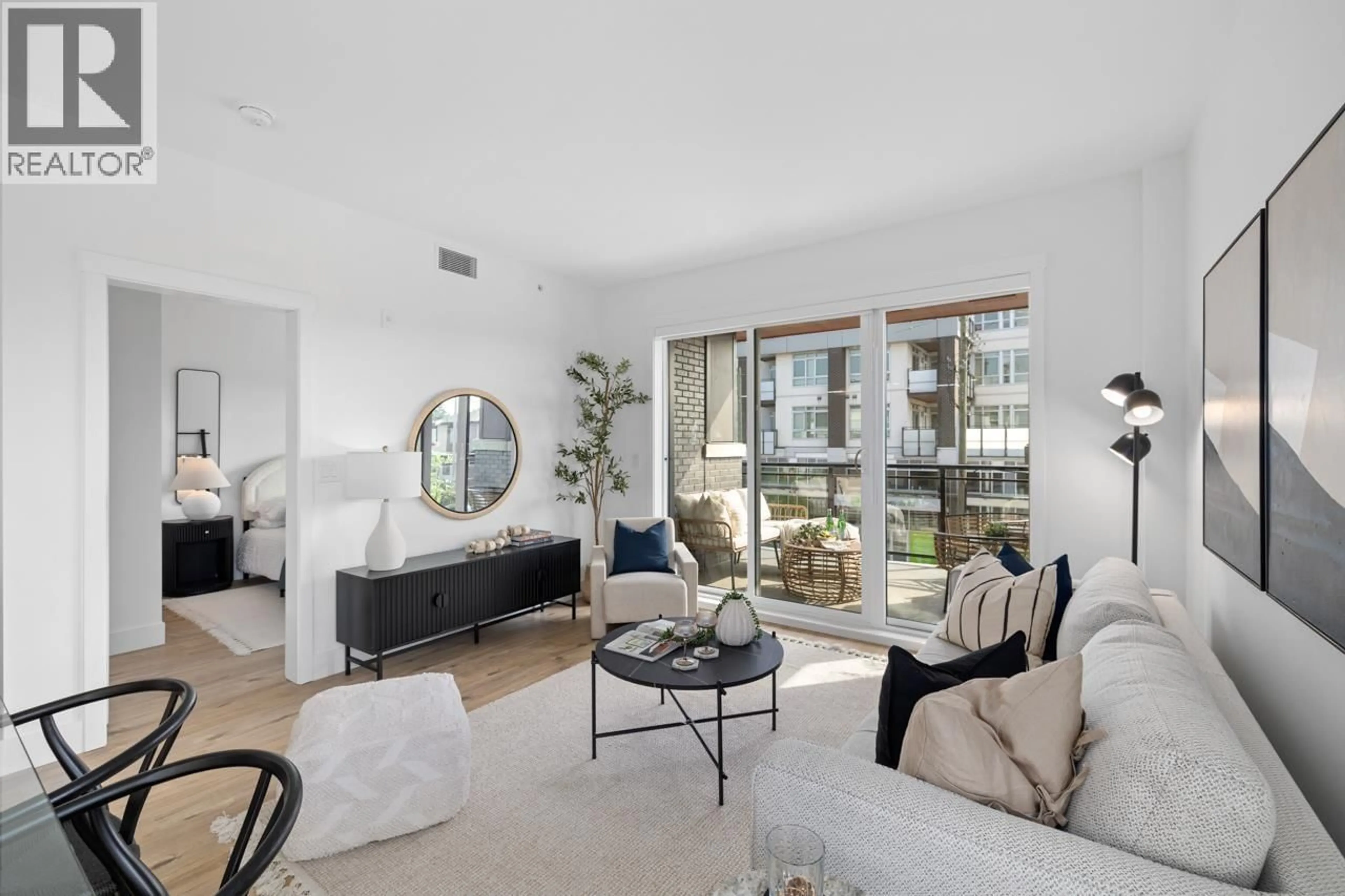 Living room with furniture, unknown for 406 - 4788 HASTINGS STREET, Burnaby British Columbia V5C0P4