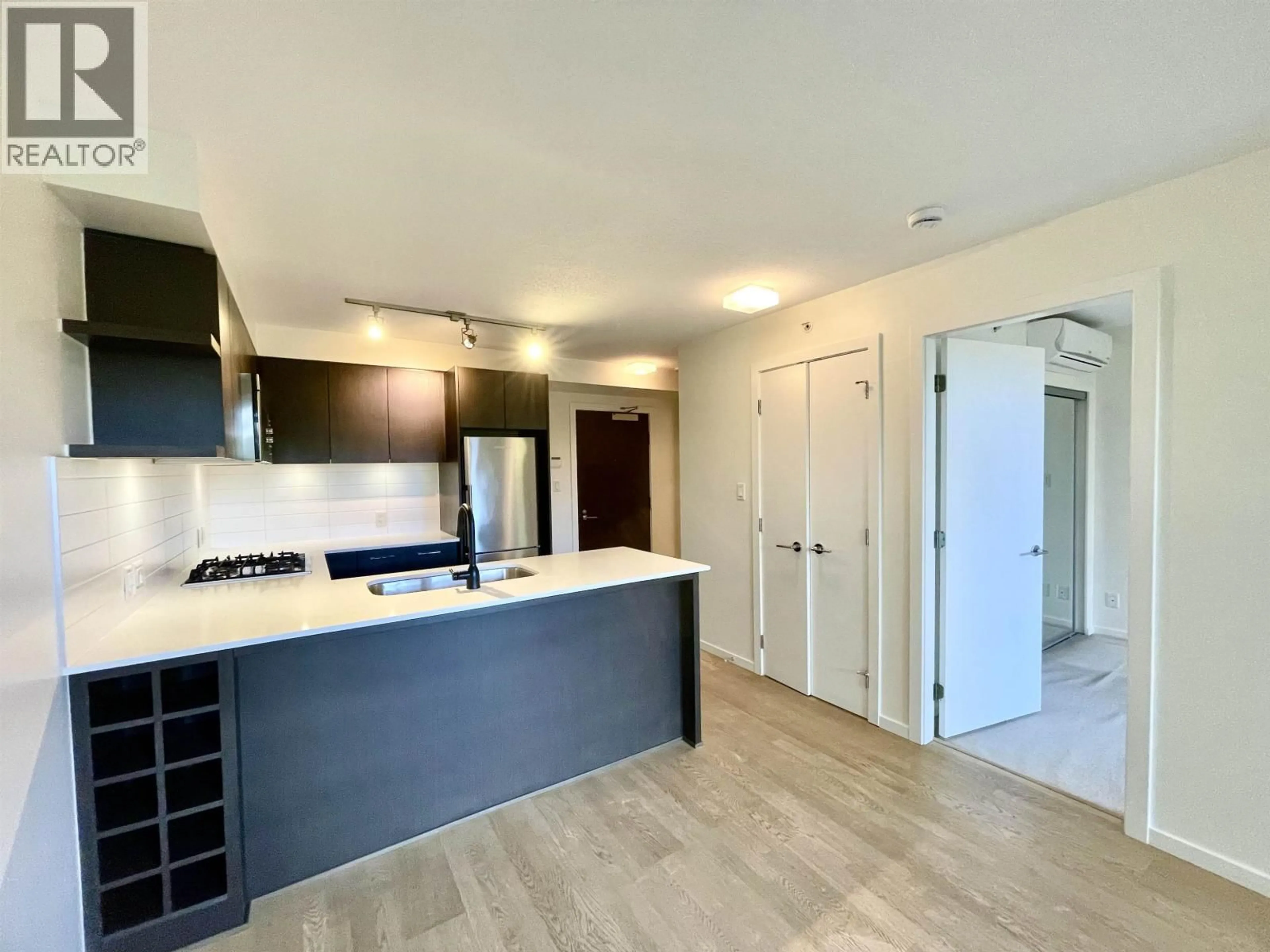 Open concept kitchen, unknown for 707 - 7733 FIRBRIDGE WAY, Richmond British Columbia V6X0M7