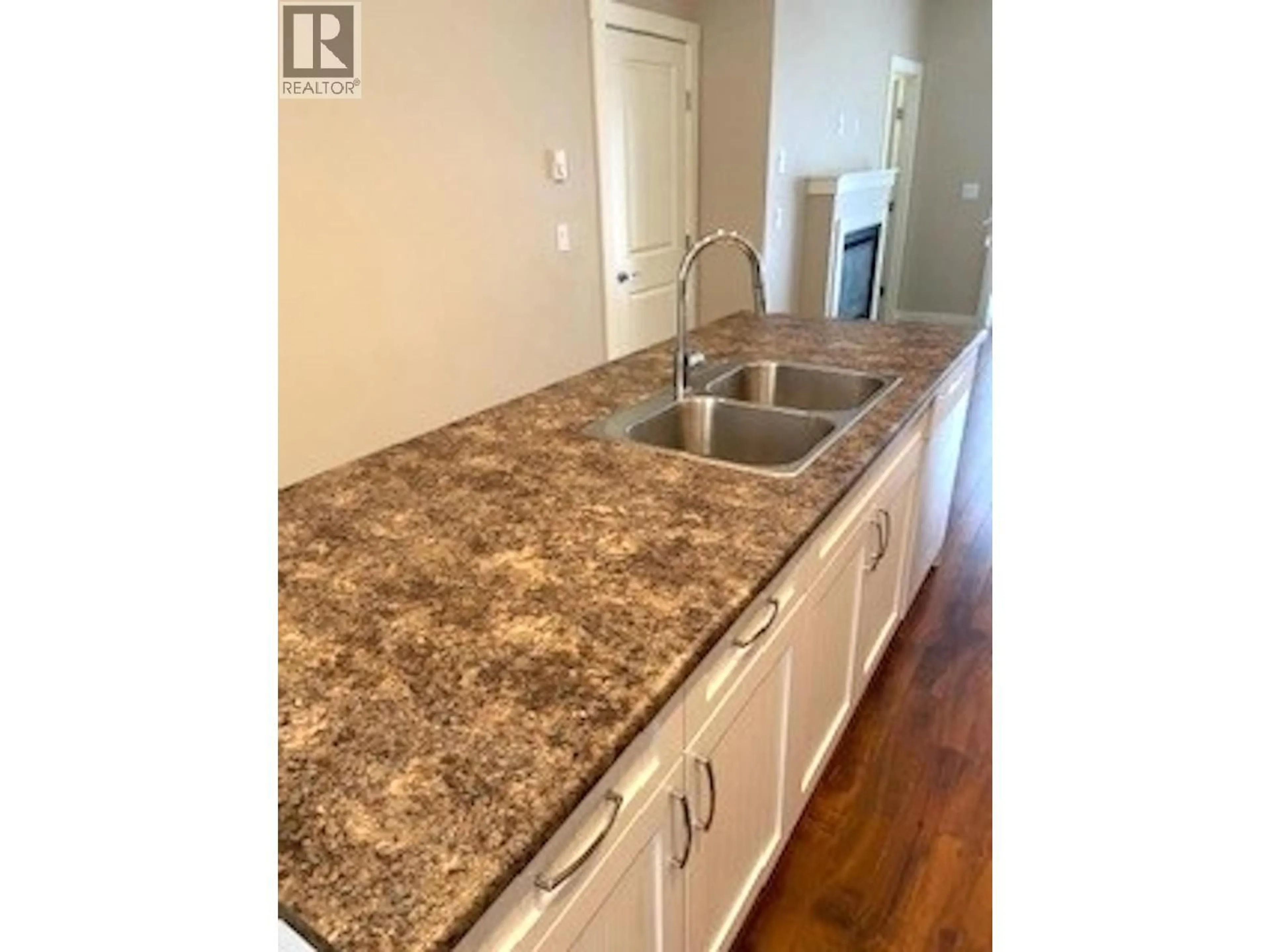 Open concept kitchen, unknown for 122 - 11008 102 AVENUE, Fort St. John British Columbia V1J2G2