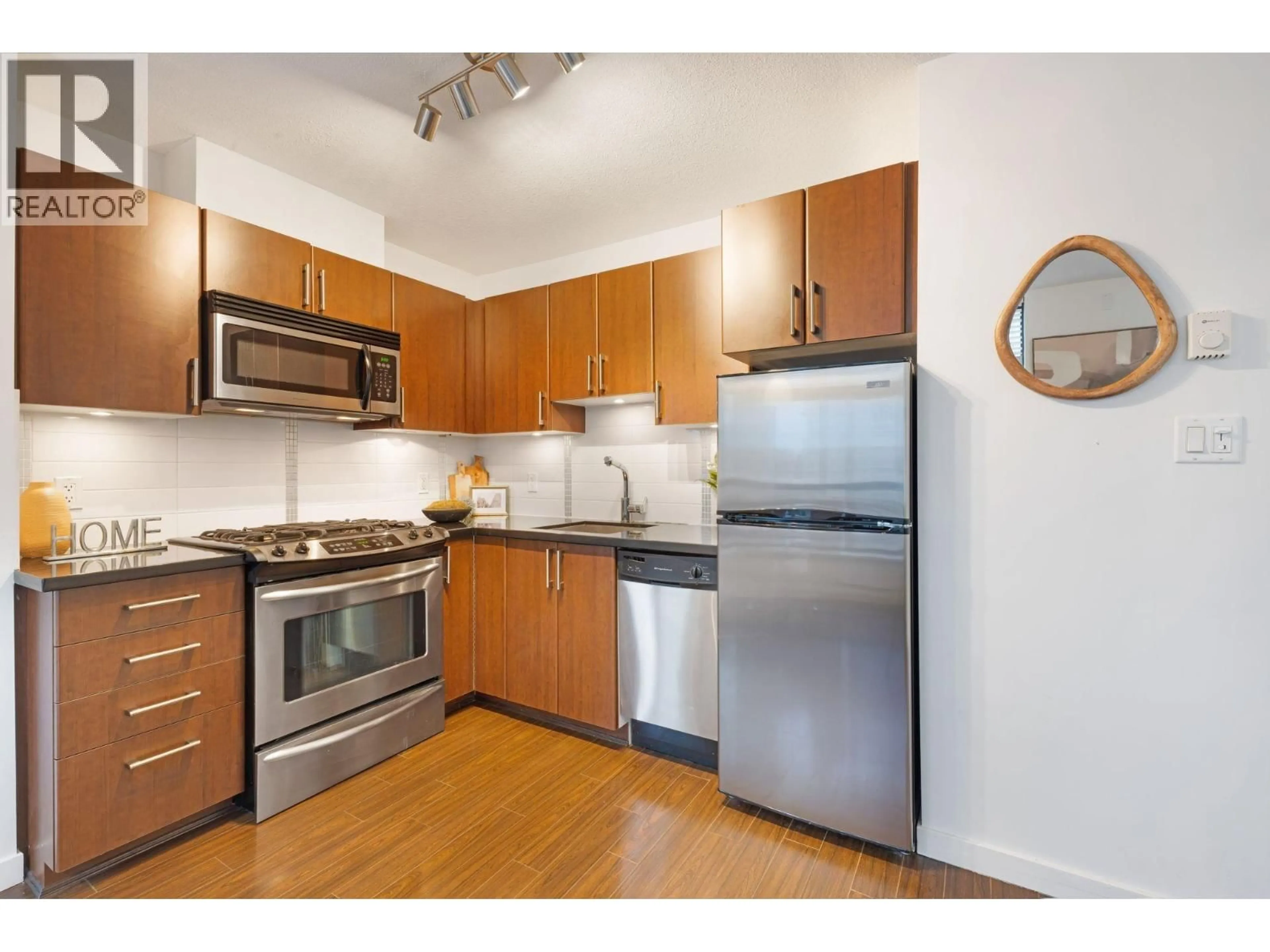 Standard kitchen, wood/laminate floor for 701 - 1068 BROADWAY, Vancouver British Columbia V6H0A7