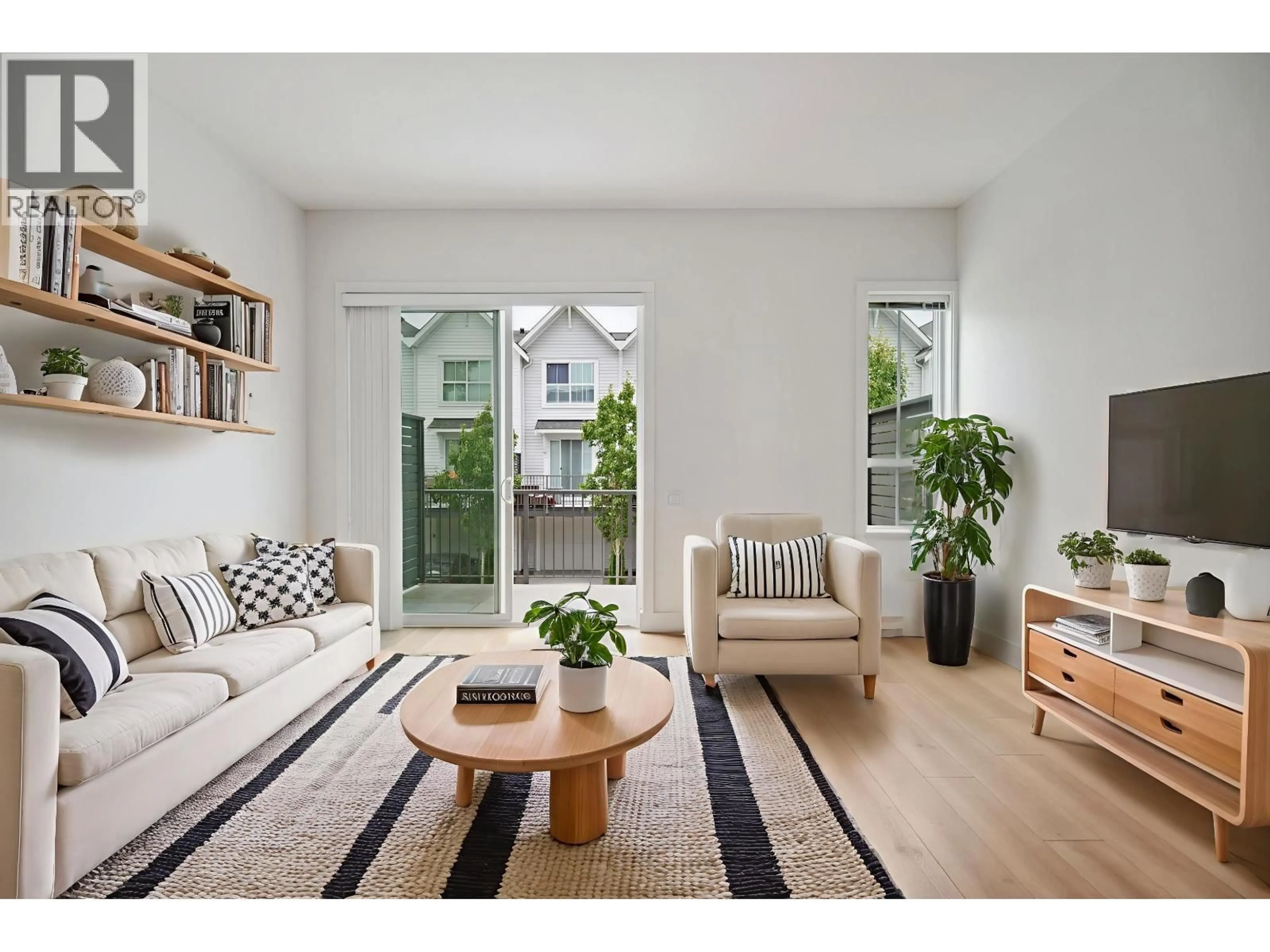 Living room with furniture, wood/laminate floor for 68 - 4638 ORCA WAY, Tsawwassen British Columbia V4M0C2