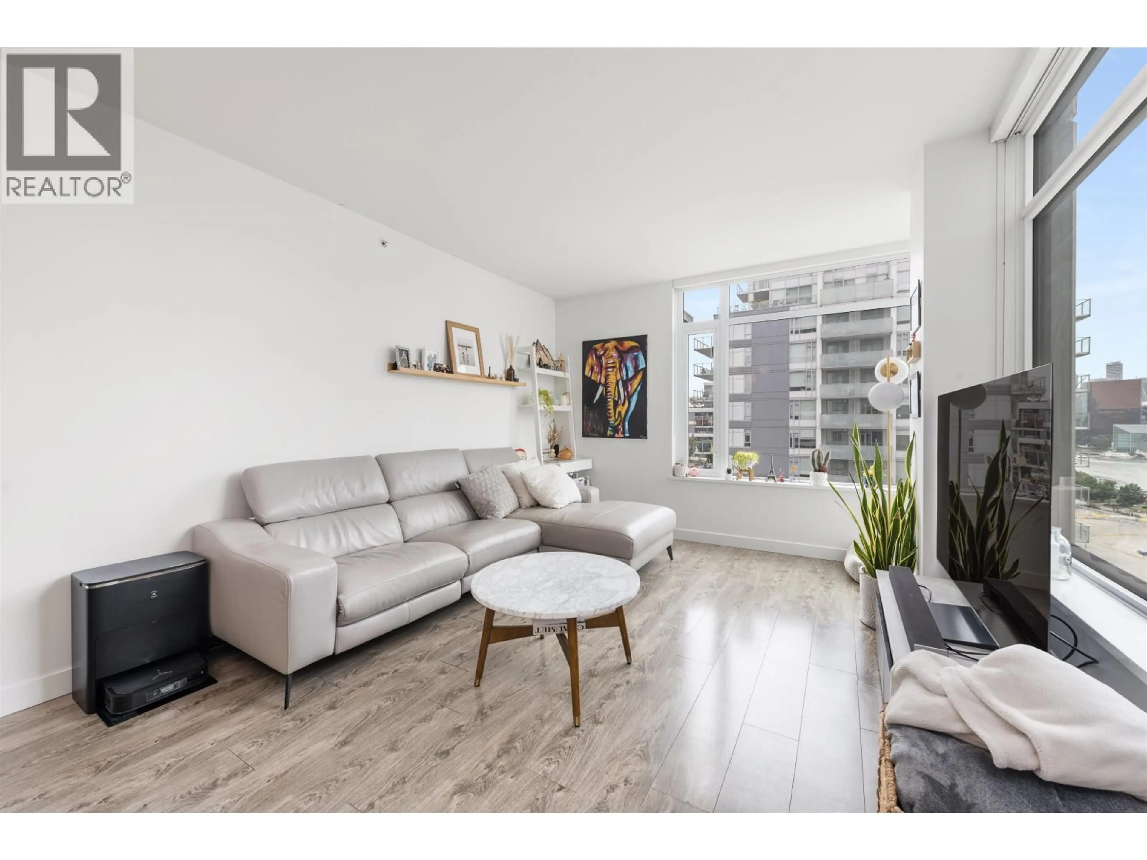 Living room with furniture, wood/laminate floor for 1103 - 110 SWITCHMEN STREET, Vancouver British Columbia V6A0C6