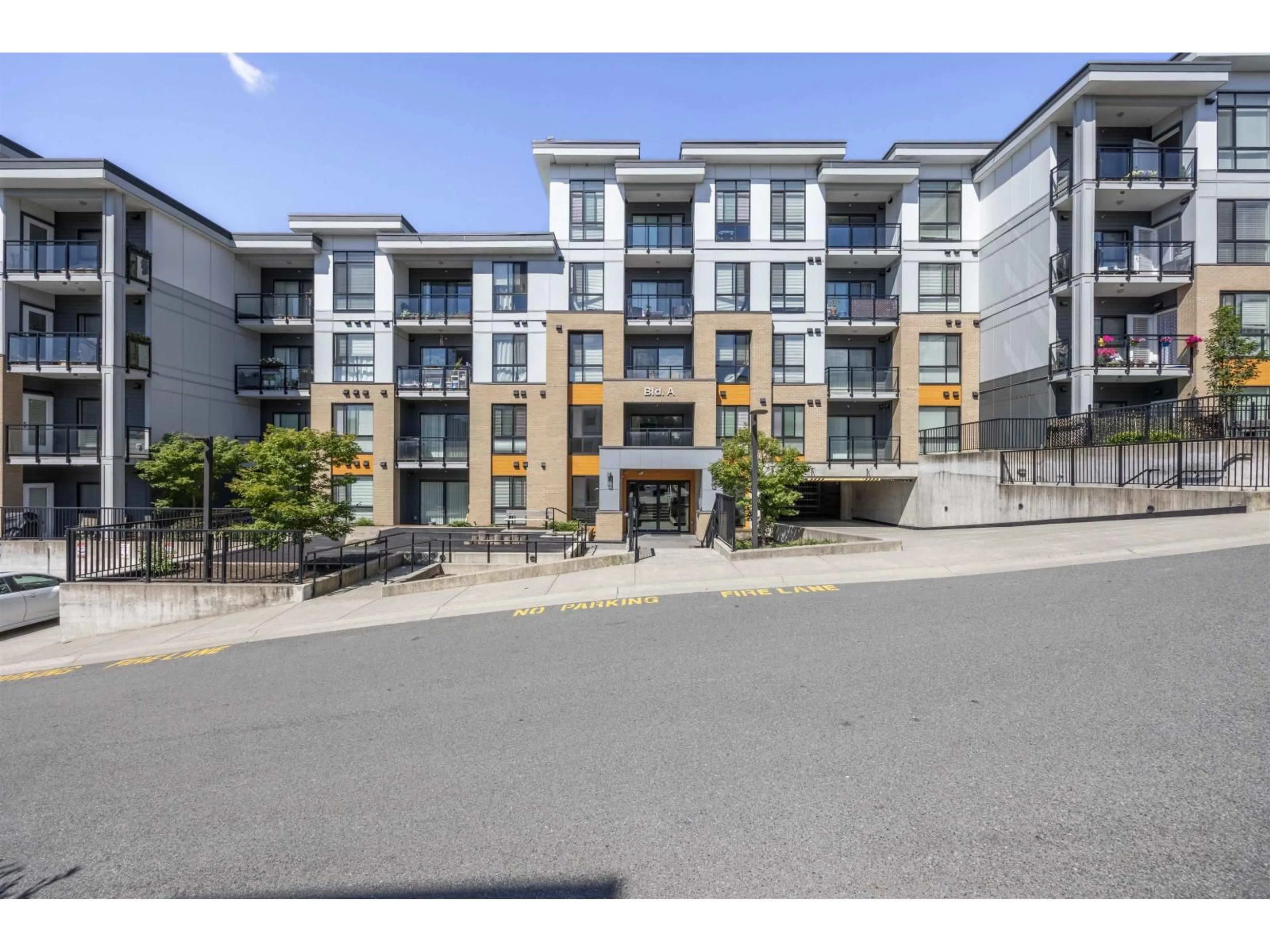 A pic from outside/outdoor area/front of a property/back of a property/a pic from drone, street for A003 - 20087 68, Langley British Columbia V2Y0Y2