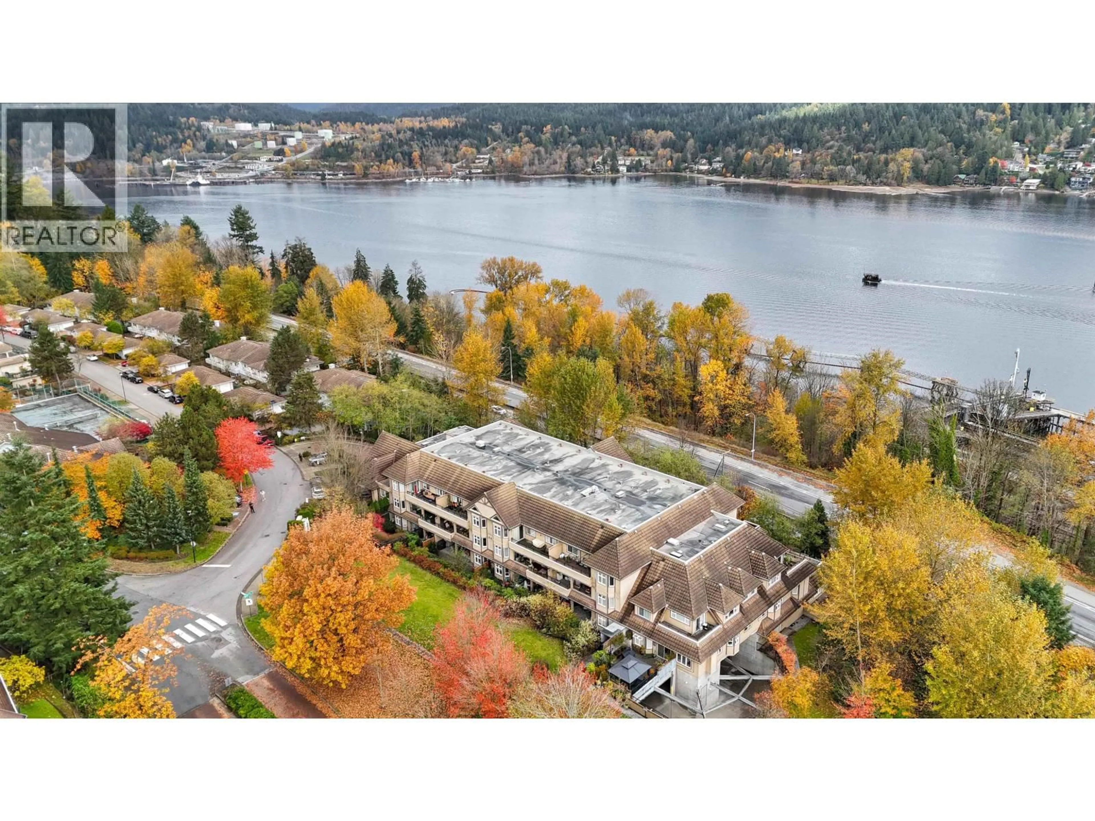 A pic from outside/outdoor area/front of a property/back of a property/a pic from drone, water/lake/river/ocean view for 111 - 160 SHORELINE CIRCLE, Port Moody British Columbia V3H0B2