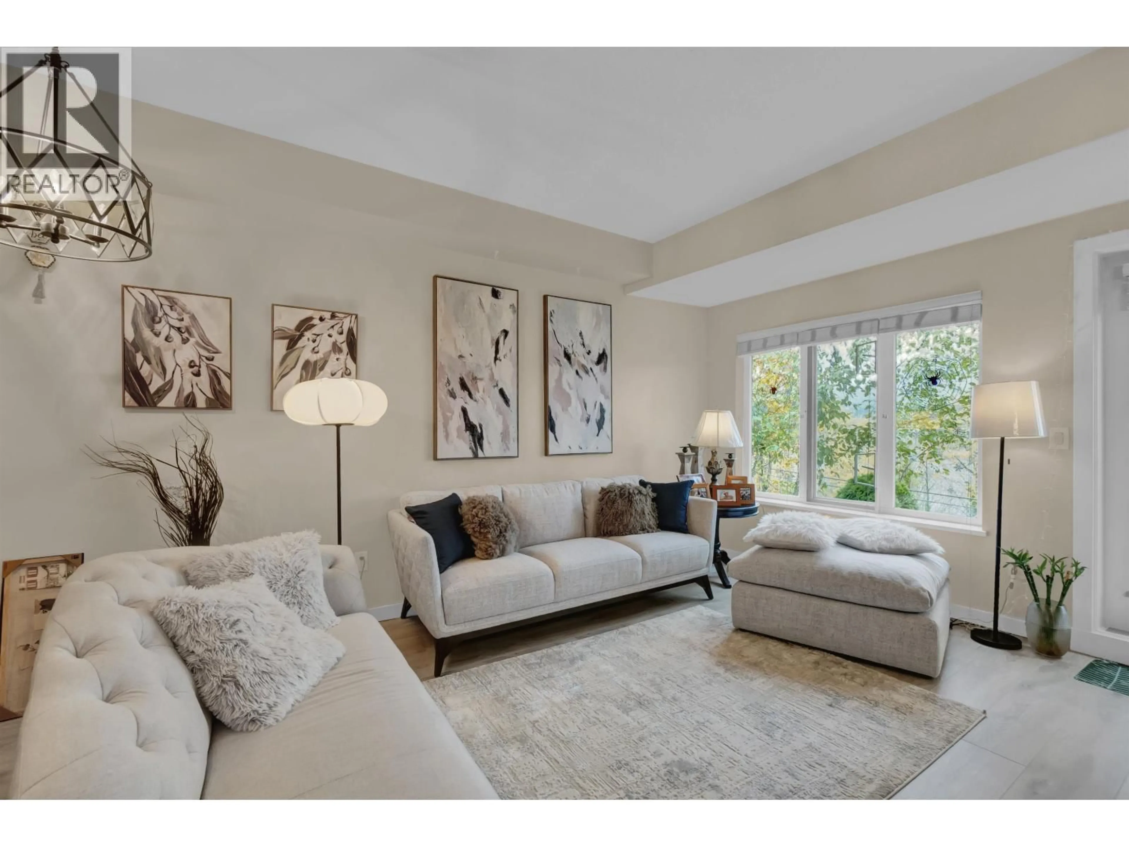 Living room with furniture, unknown for 111 - 160 SHORELINE CIRCLE, Port Moody British Columbia V3H0B2