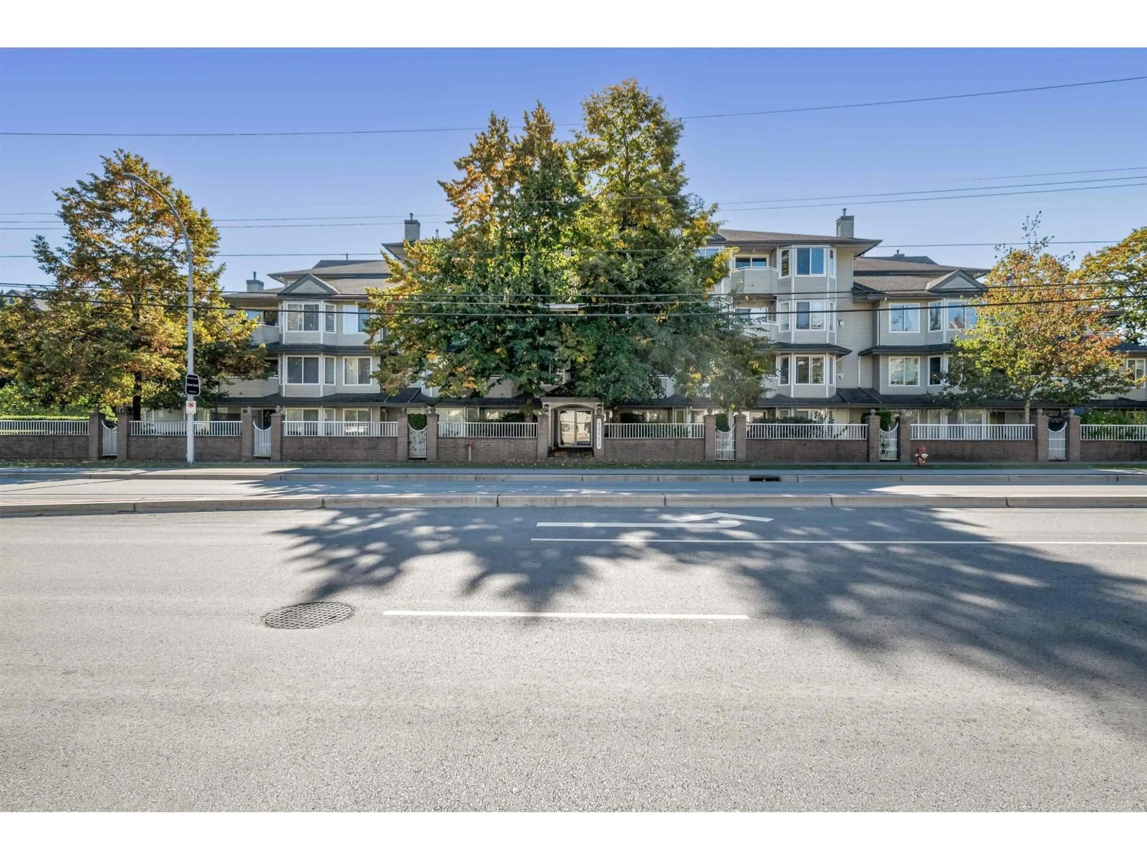 A pic from outside/outdoor area/front of a property/back of a property/a pic from drone, street for 401 - 12110 80, Surrey British Columbia V3W0V2