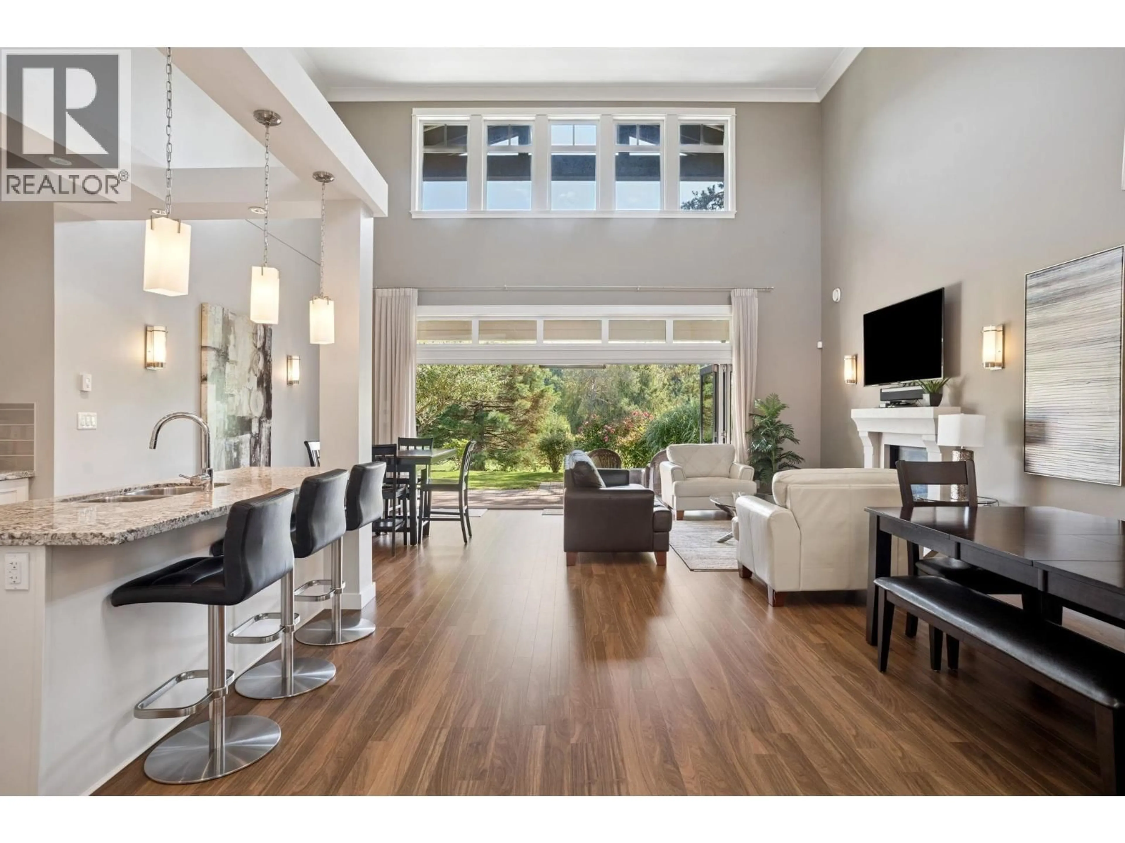 Open concept kitchen, wood/laminate floor for 5044 CEDAR SPRINGS DRIVE, Delta British Columbia V4M0A7