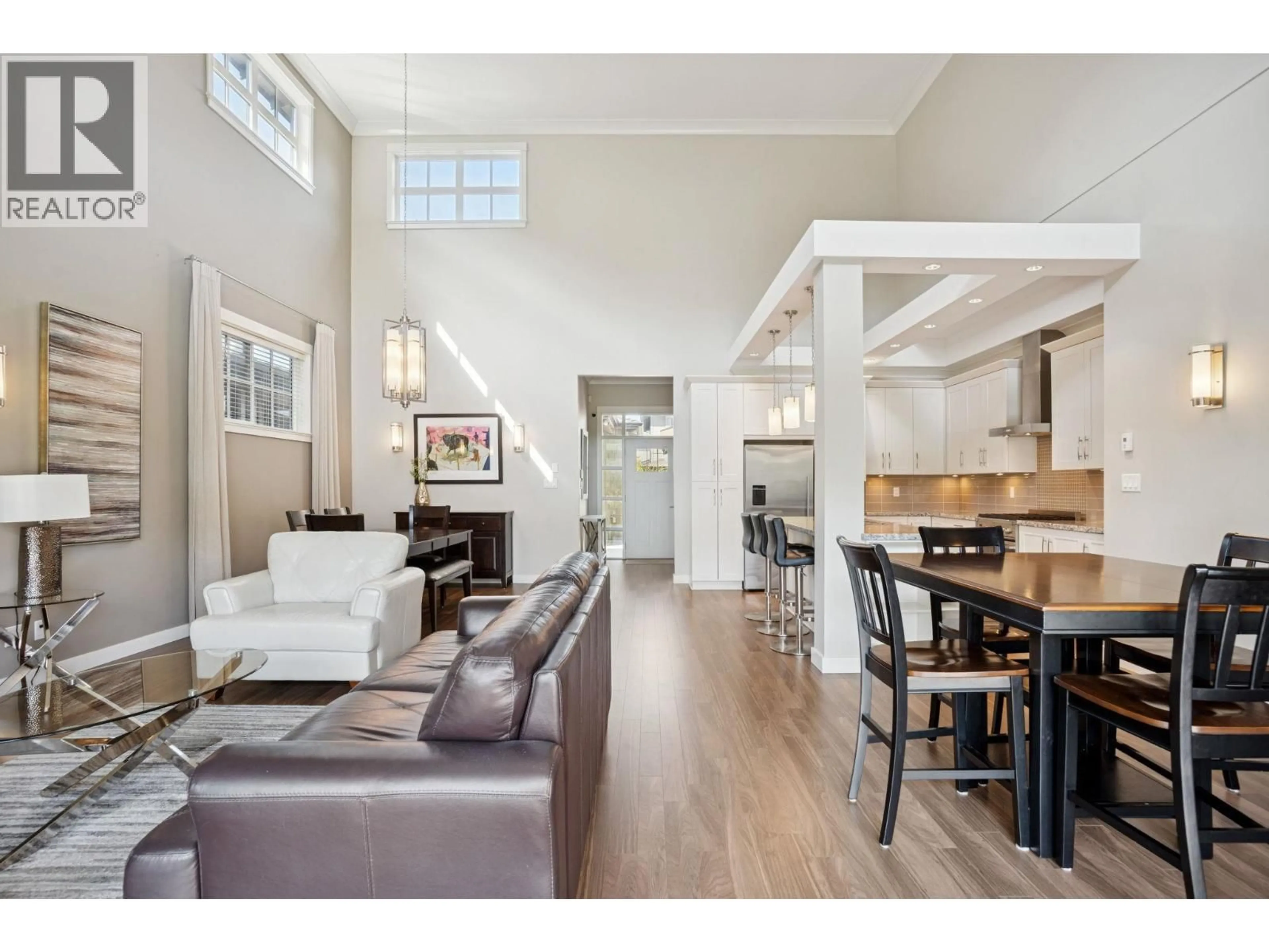 Open concept kitchen, wood/laminate floor for 5044 CEDAR SPRINGS DRIVE, Delta British Columbia V4M0A7