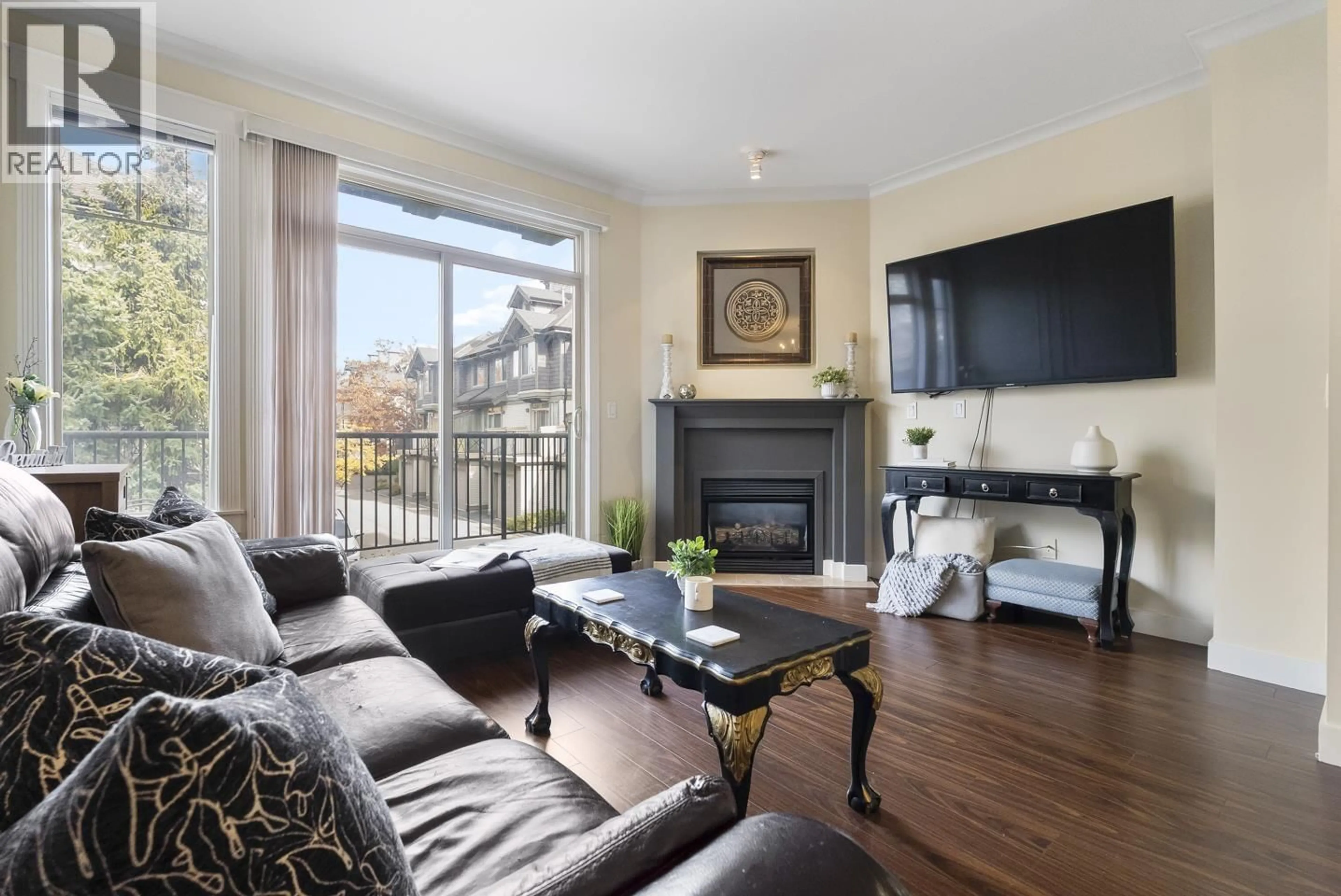 Living room with furniture, wood/laminate floor for 42 - 6233 BIRCH STREET, Richmond British Columbia V6Y4H3