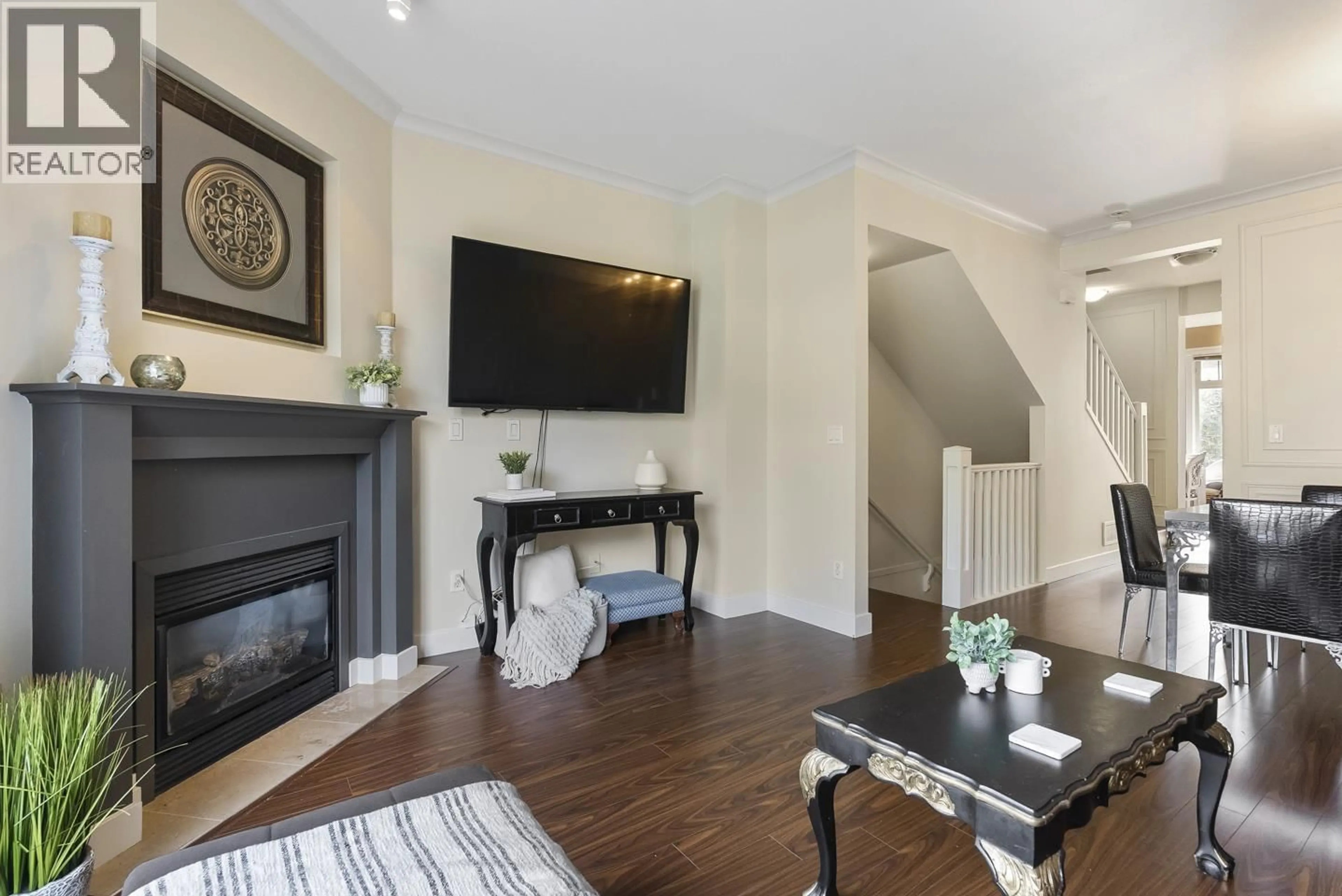 Living room with furniture, wood/laminate floor for 42 - 6233 BIRCH STREET, Richmond British Columbia V6Y4H3