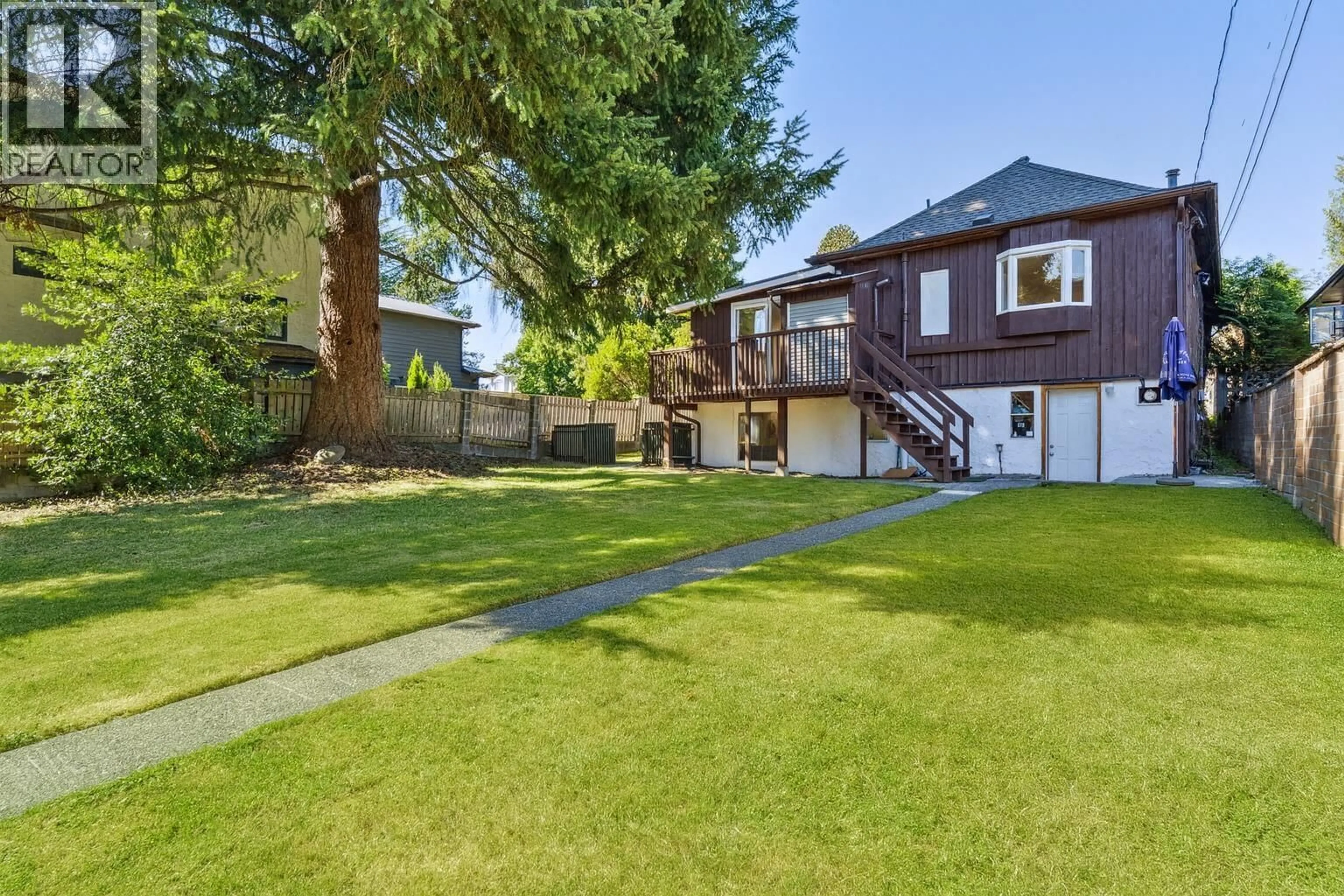 A pic from outside/outdoor area/front of a property/back of a property/a pic from drone, street for 865 12TH STREET, North Vancouver British Columbia V7L2L2