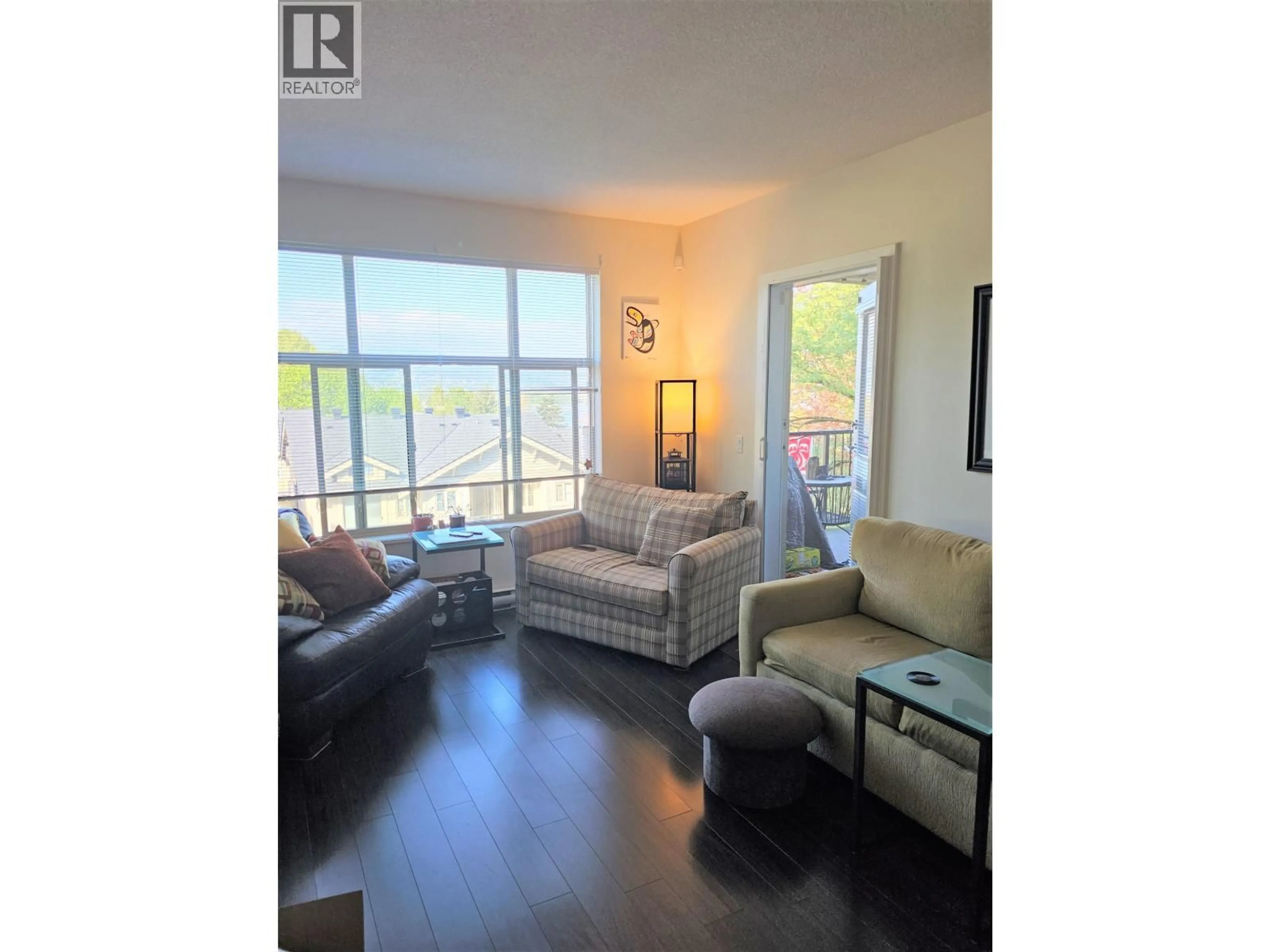 Living room with furniture, wood/laminate floor for 301 - 240 FRANCIS WAY, New Westminster British Columbia V3L0E5