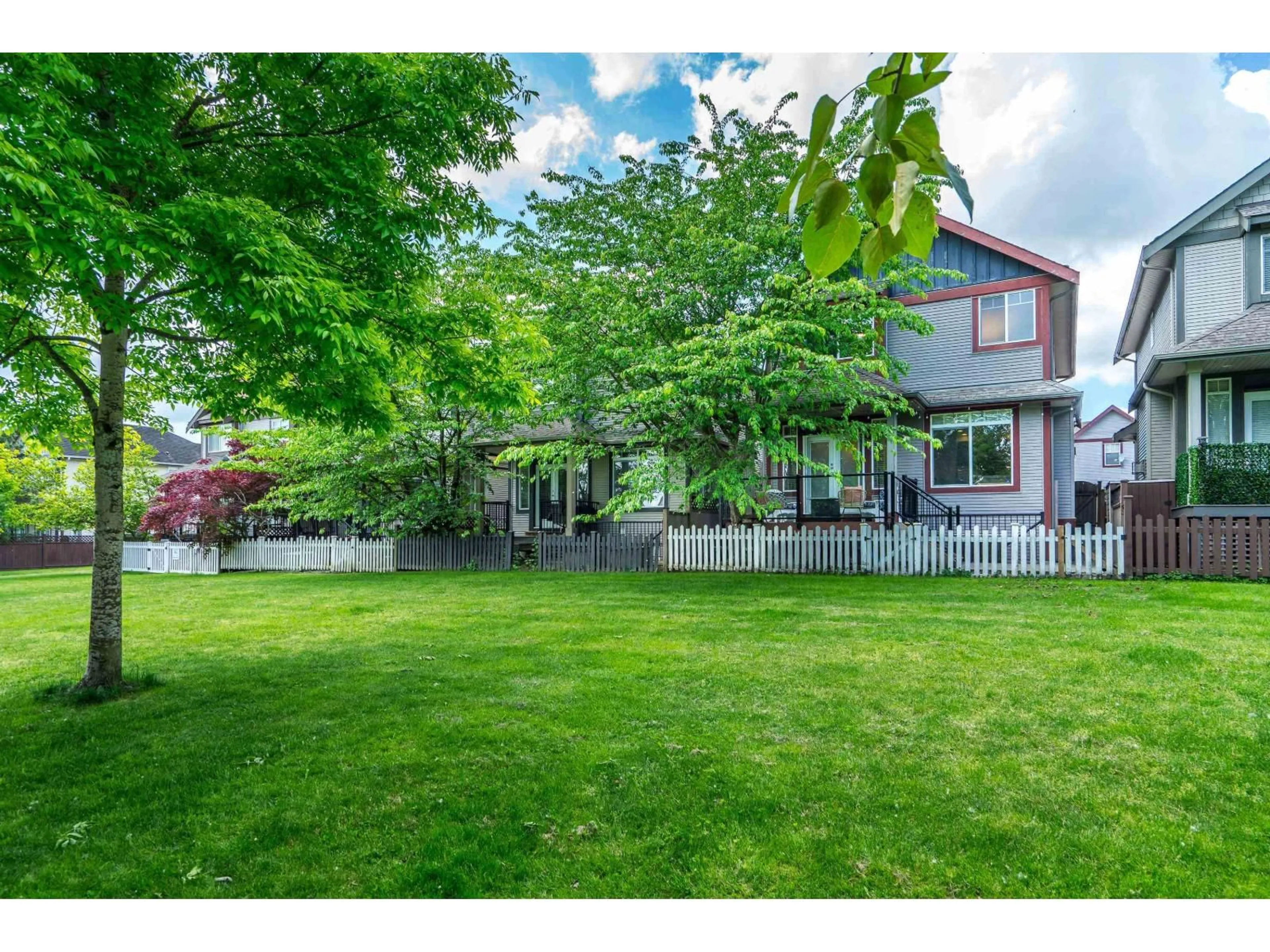 A pic from outside/outdoor area/front of a property/back of a property/a pic from drone, street for 6668 195, Surrey British Columbia V4N0C3