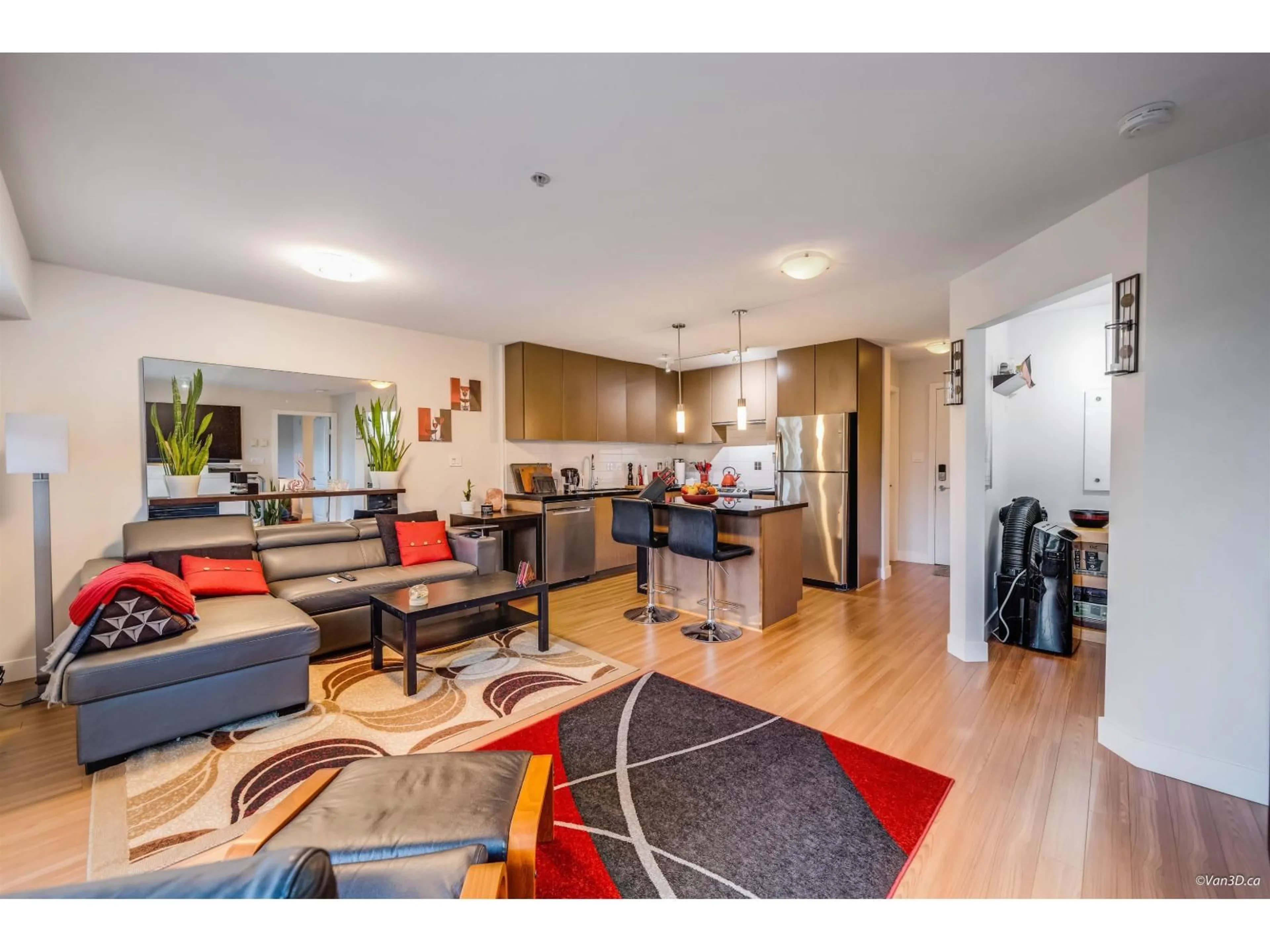 Open concept kitchen, wood/laminate floor for 313 - 15735 CROYDON, Surrey British Columbia V3Z2L5