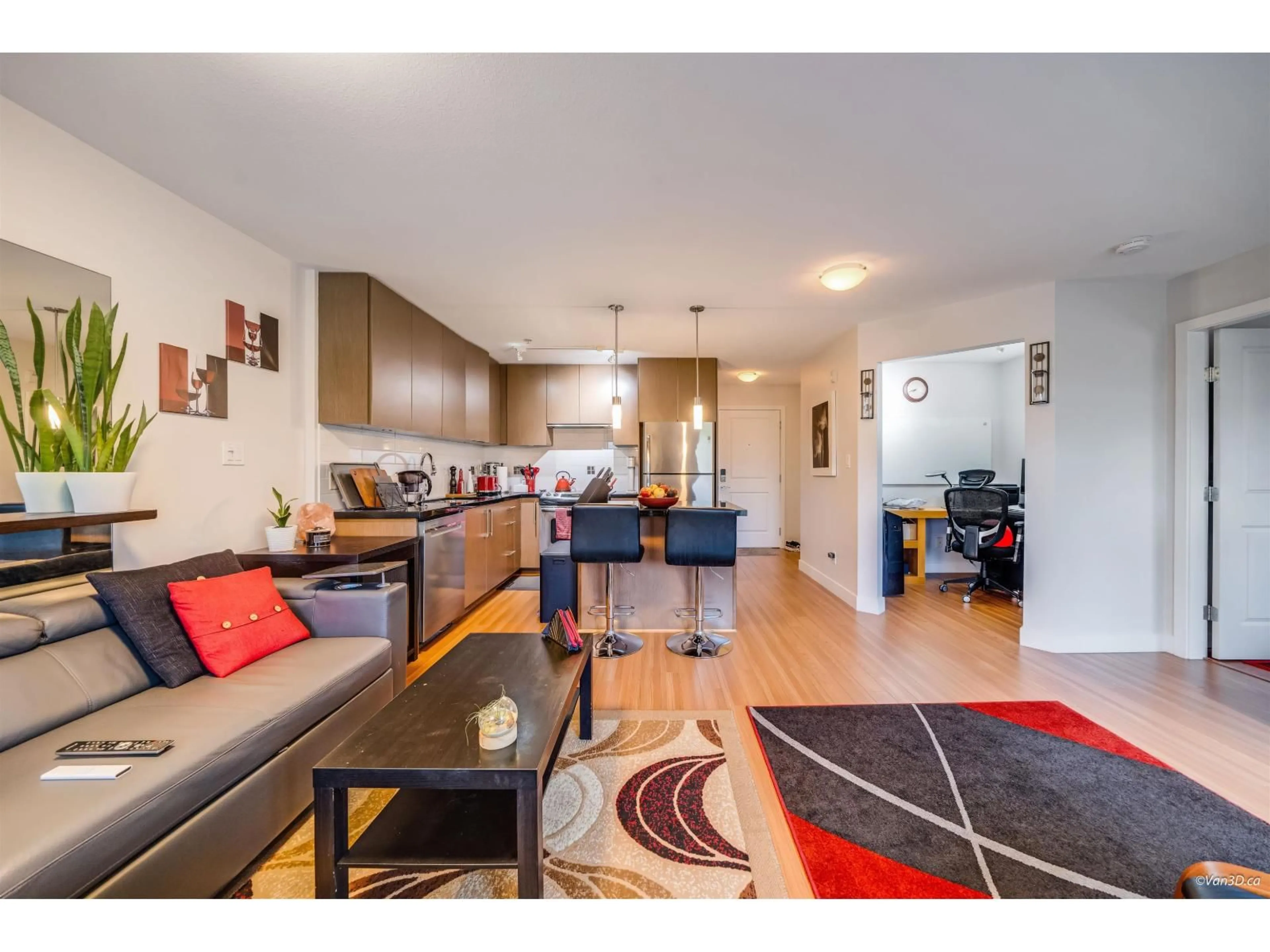 Open concept kitchen, wood/laminate floor for 313 - 15735 CROYDON, Surrey British Columbia V3Z2L5