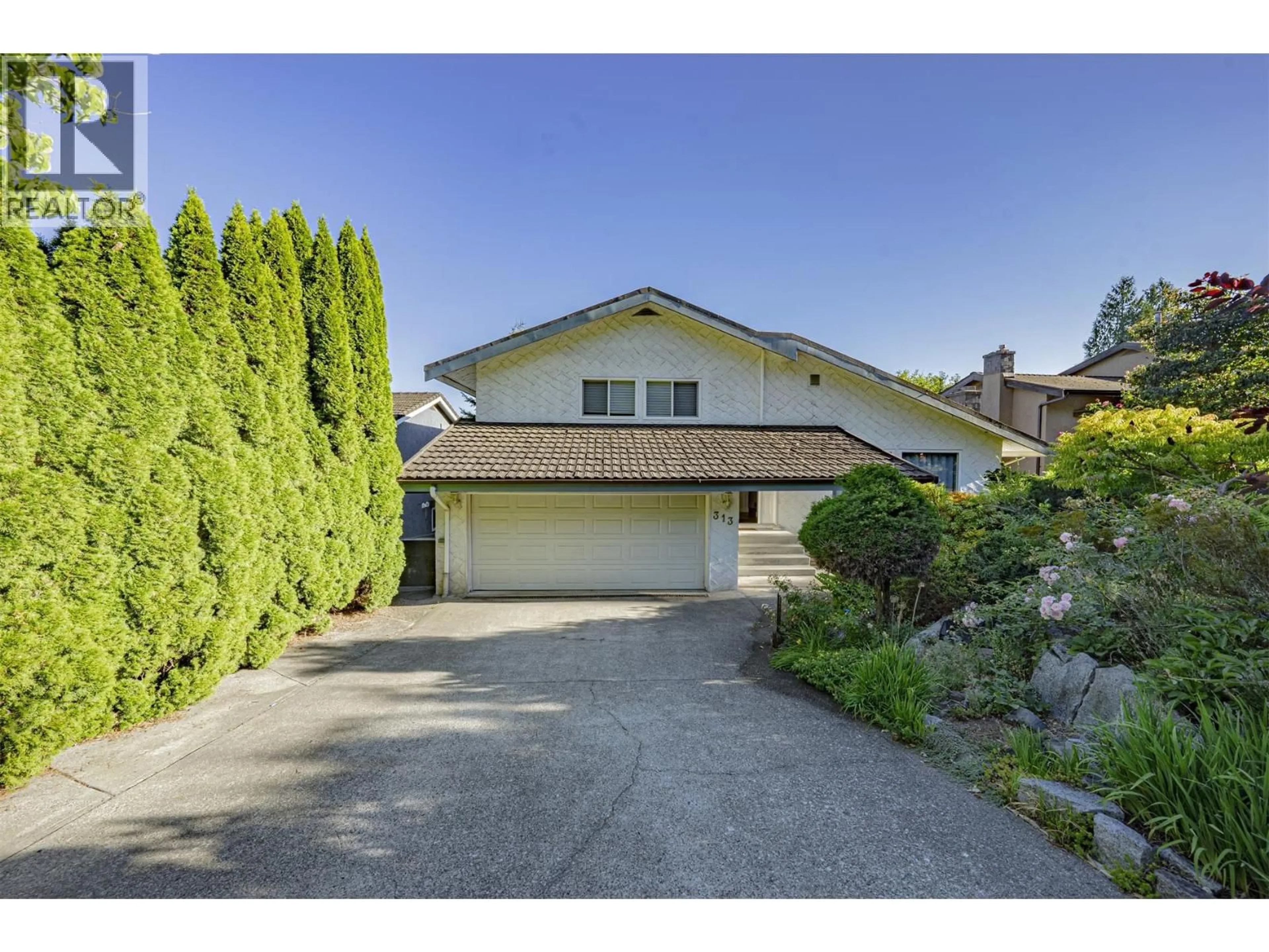 A pic from outside/outdoor area/front of a property/back of a property/a pic from drone, street for 313 HICKEY DRIVE, Coquitlam British Columbia V3K5T3