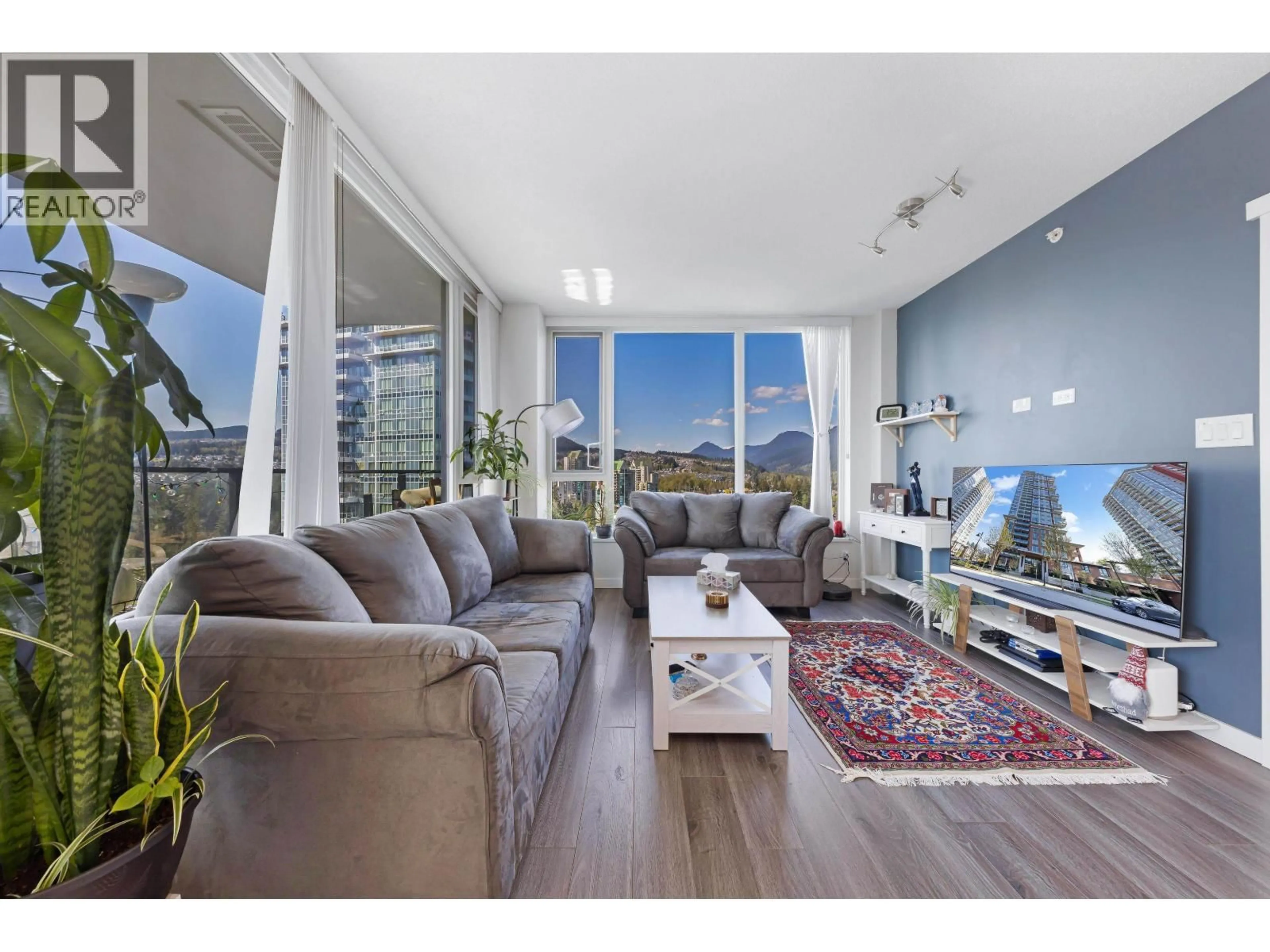 Living room with furniture, wood/laminate floor for 1705 - 3100 WINDSOR GATE, Coquitlam British Columbia V3B0P3