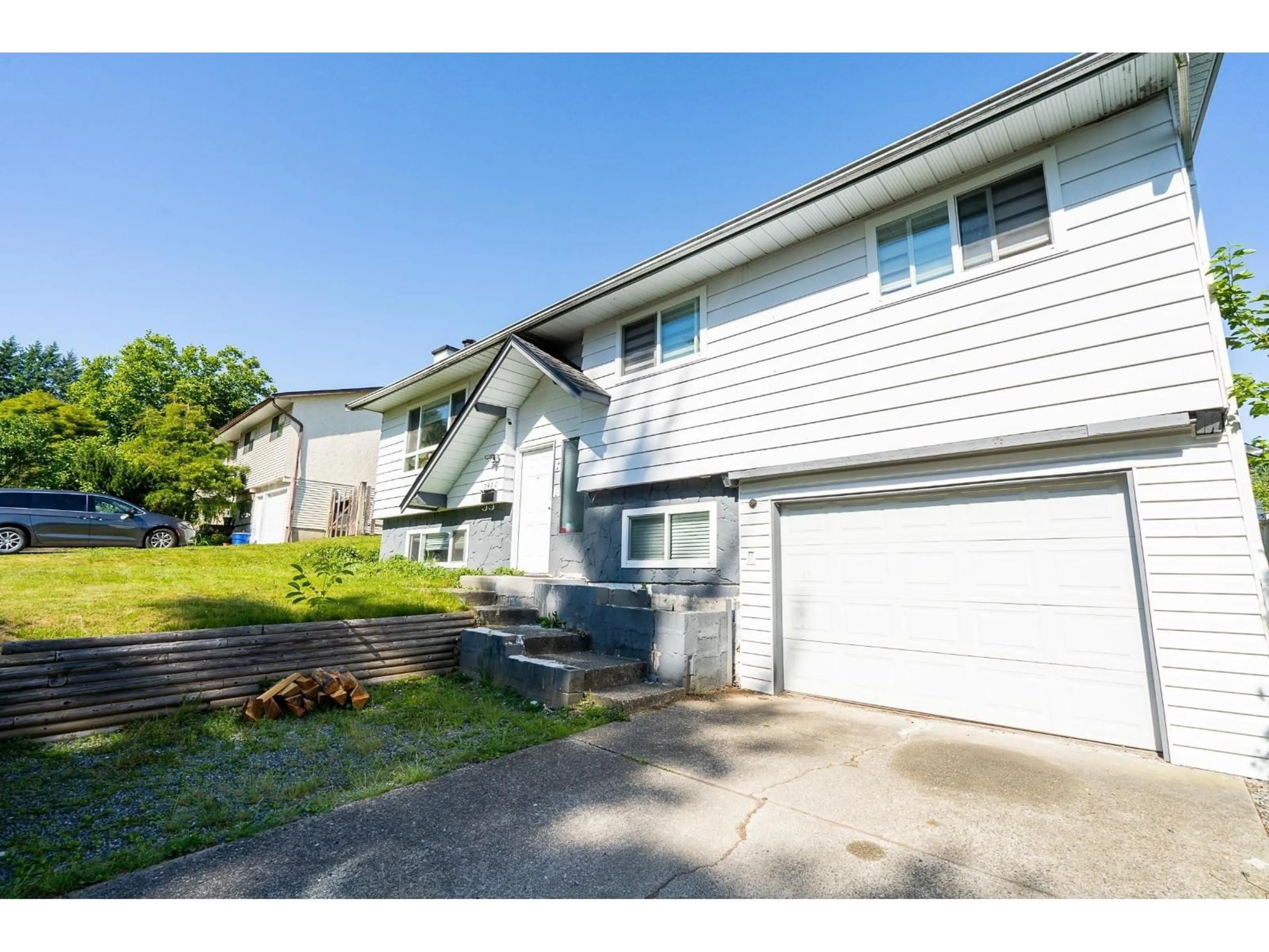 Home with vinyl exterior material, street for 7902 HERON STREET, Mission British Columbia V2V6A1