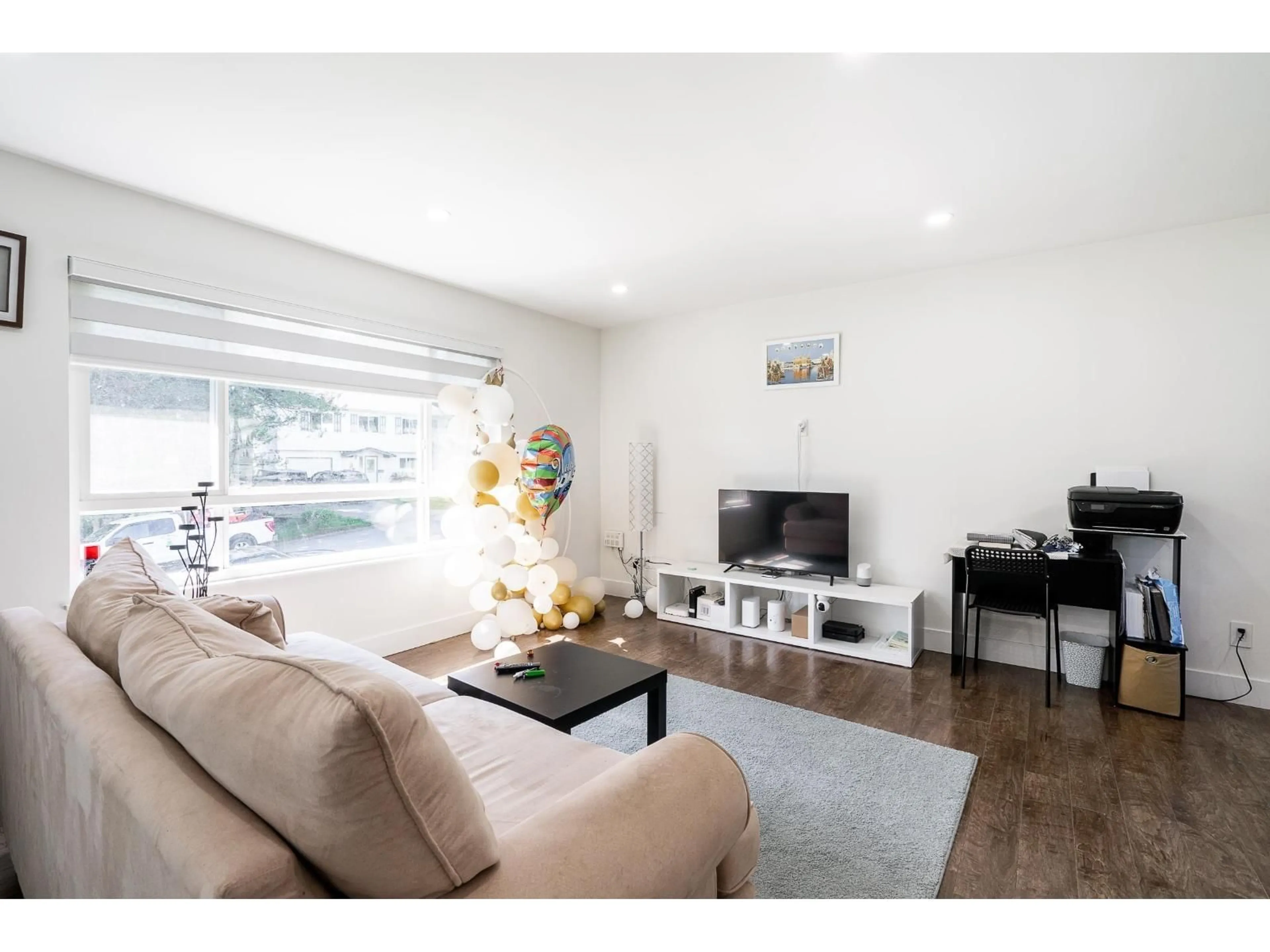 Living room with furniture, wood/laminate floor for 7902 HERON STREET, Mission British Columbia V2V6A1