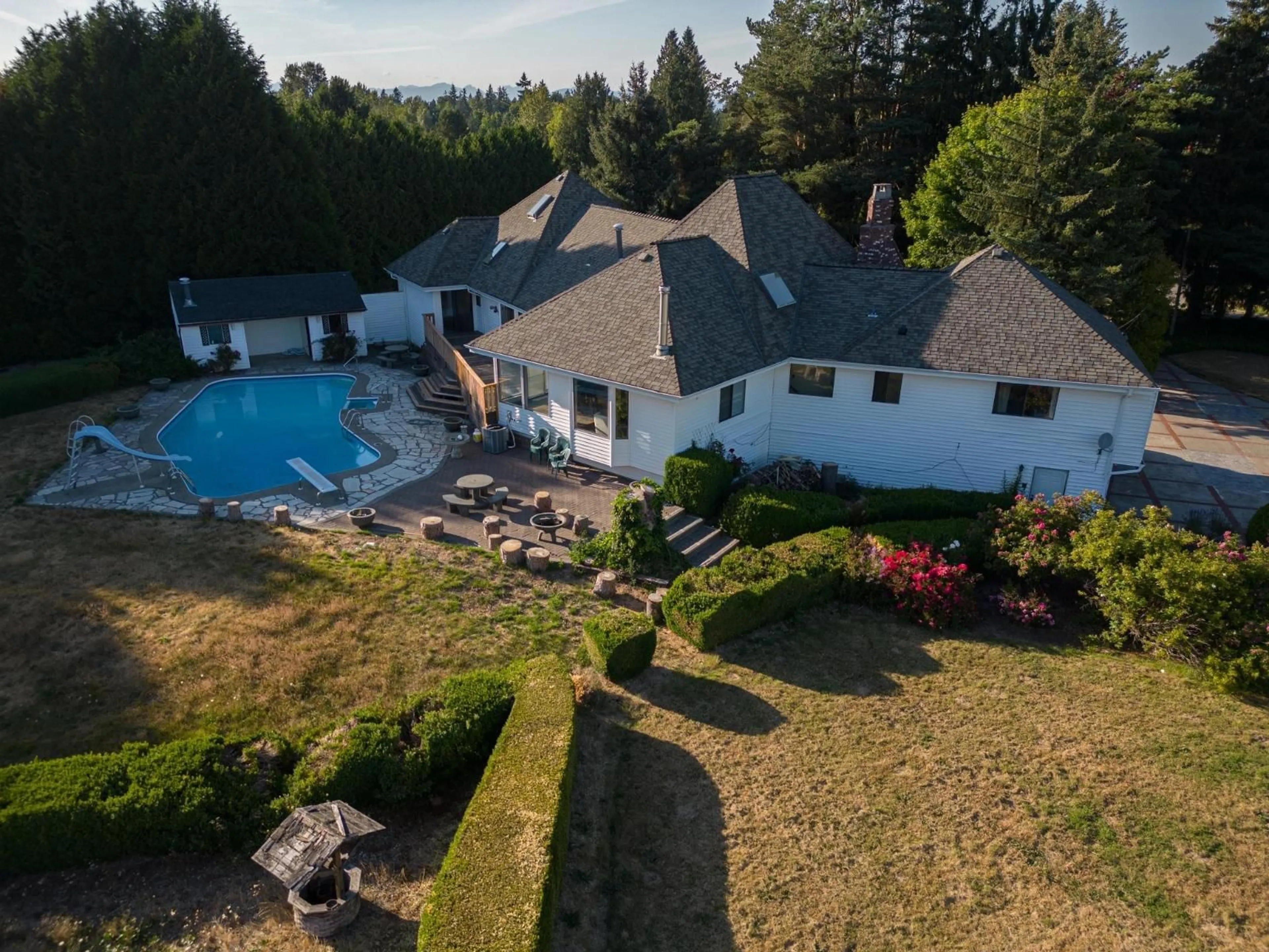 A pic from outside/outdoor area/front of a property/back of a property/a pic from drone, water/lake/river/ocean view for 21480 18, Langley British Columbia V2Z2G1