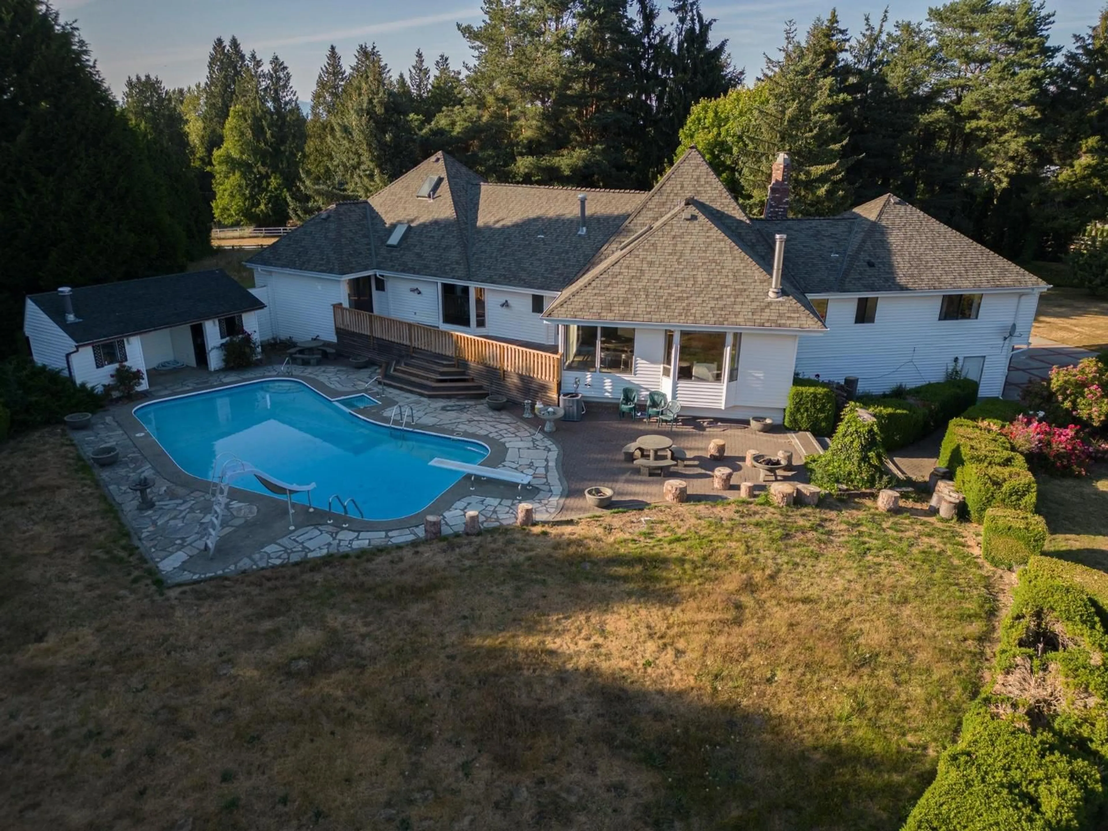 A pic from outside/outdoor area/front of a property/back of a property/a pic from drone, water/lake/river/ocean view for 21480 18, Langley British Columbia V2Z2G1
