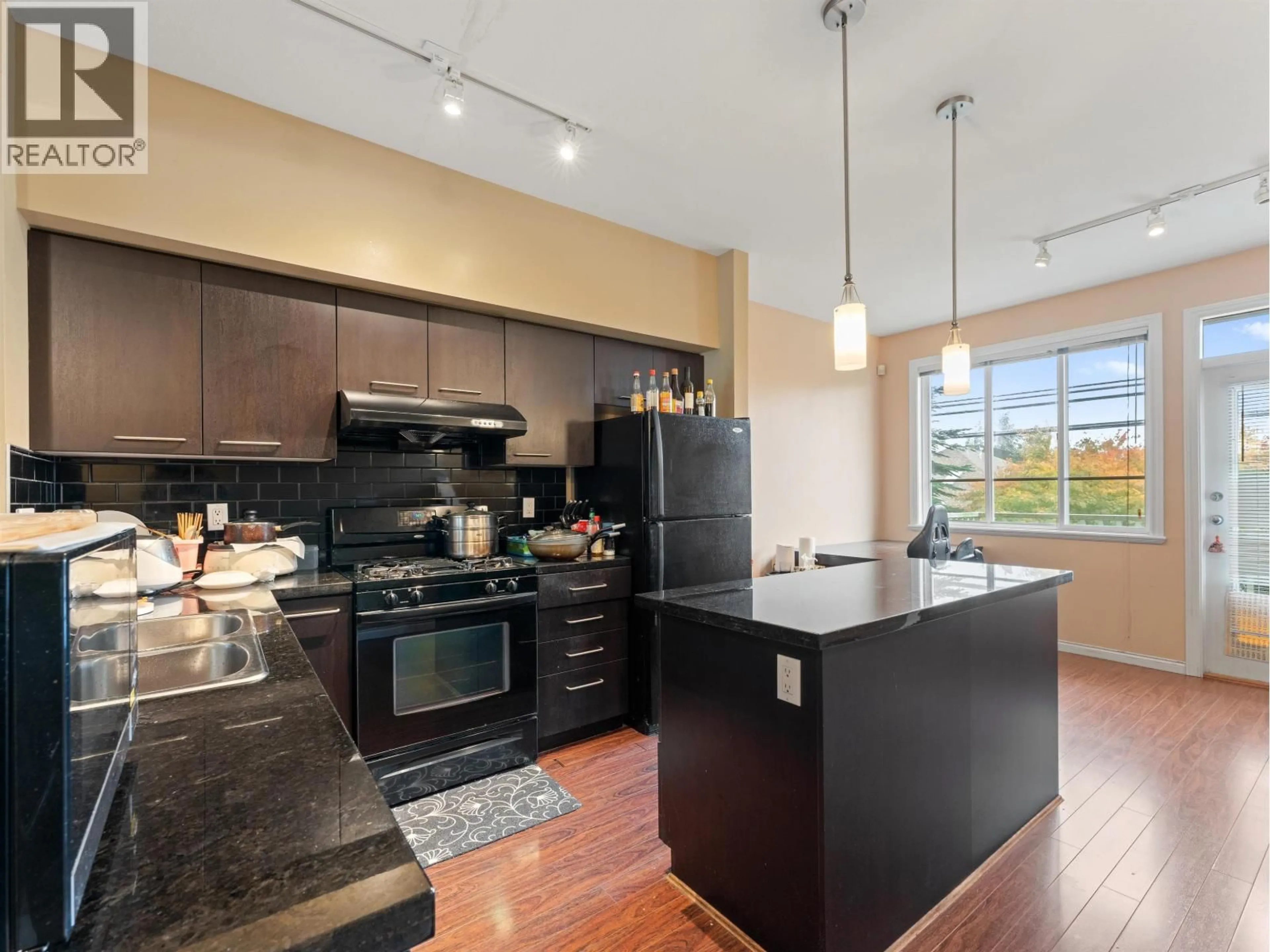 Open concept kitchen, ceramic/tile floor for 27 - 8080 FRANCIS ROAD, Richmond British Columbia V6Y1A4