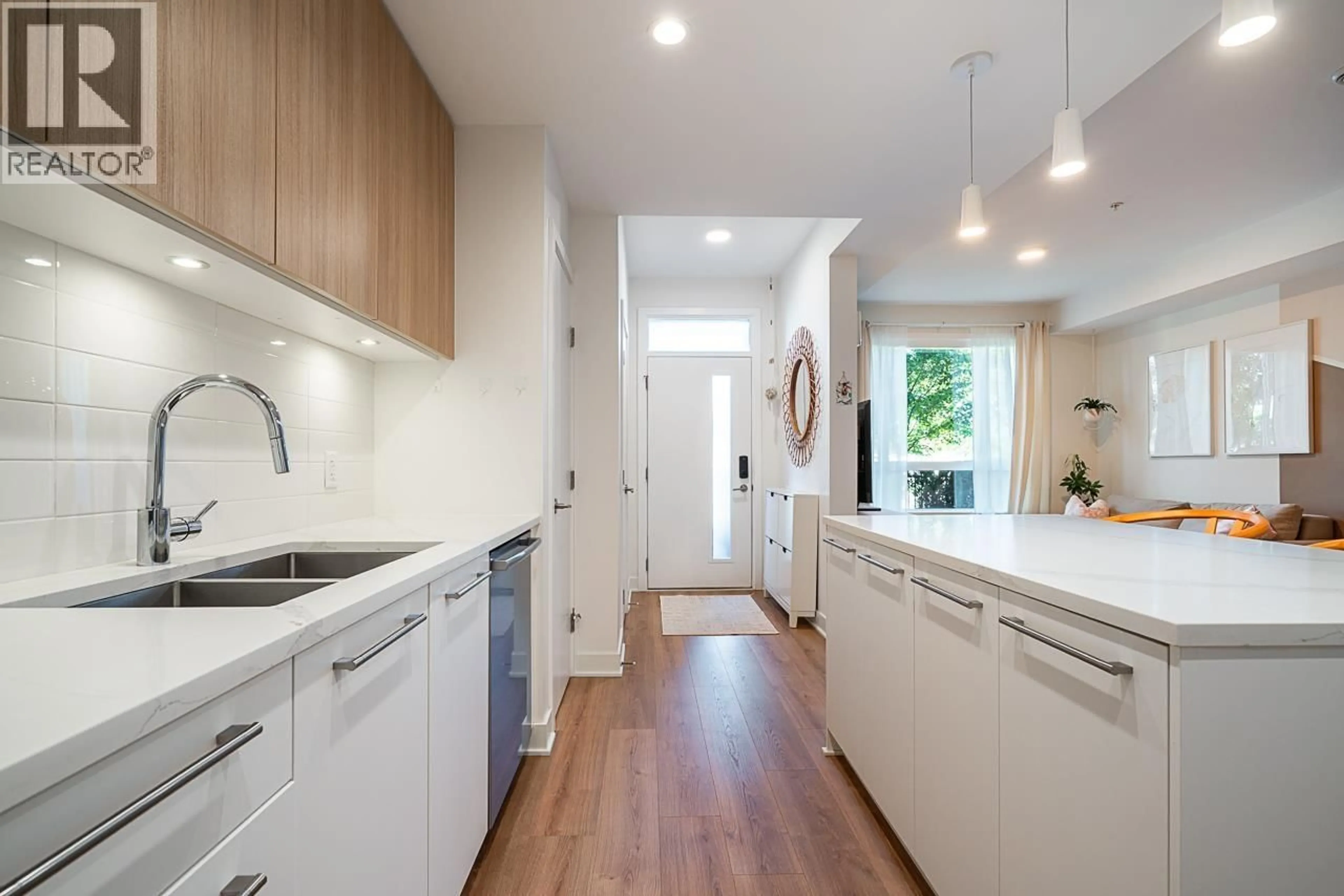 Open concept kitchen, unknown for 103 - 2035 GLENAIRE DRIVE, North Vancouver British Columbia V7P1Y2