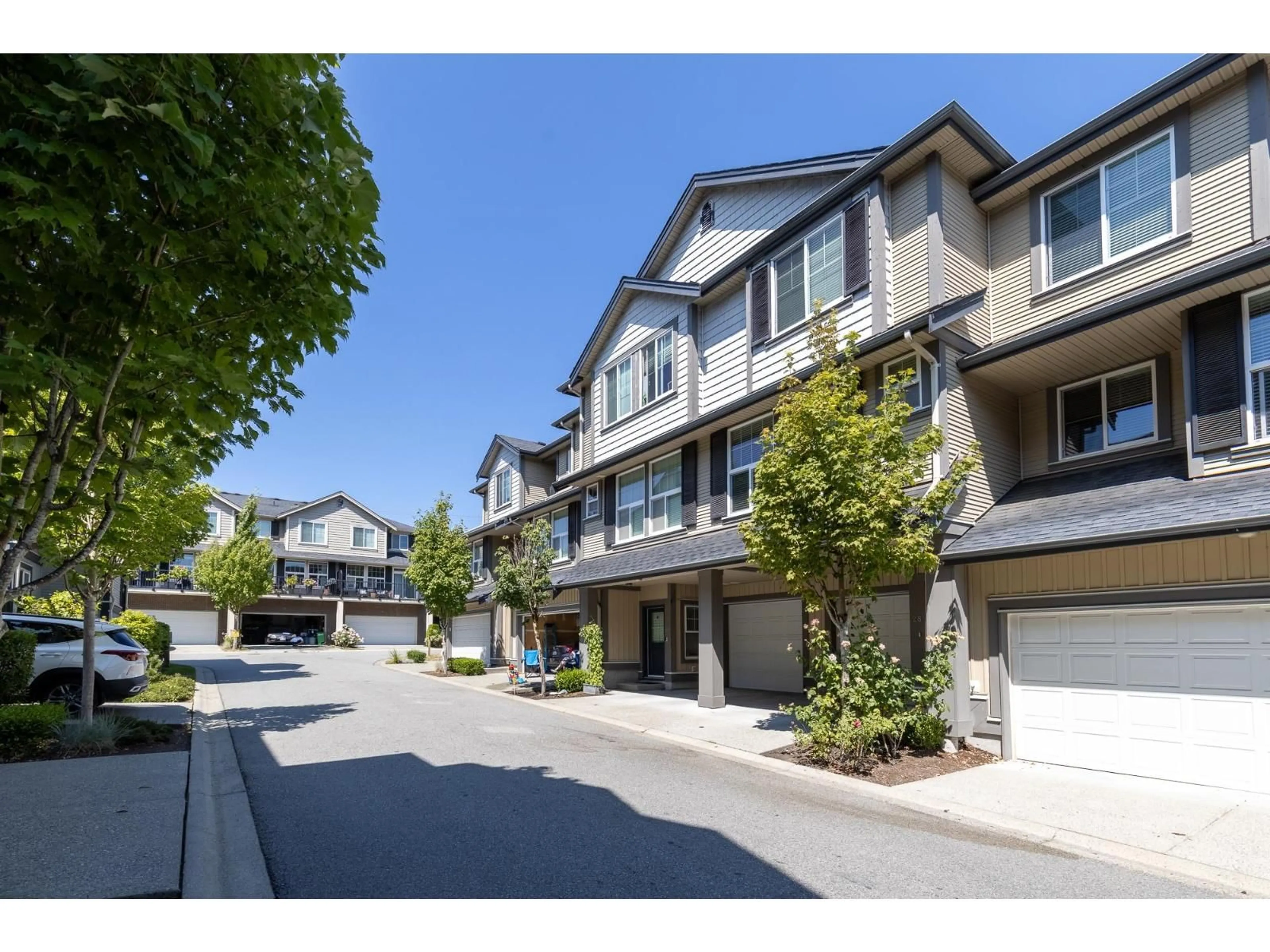 A pic from outside/outdoor area/front of a property/back of a property/a pic from drone, street for 28 - 20831 70, Langley British Columbia V2Y0H1