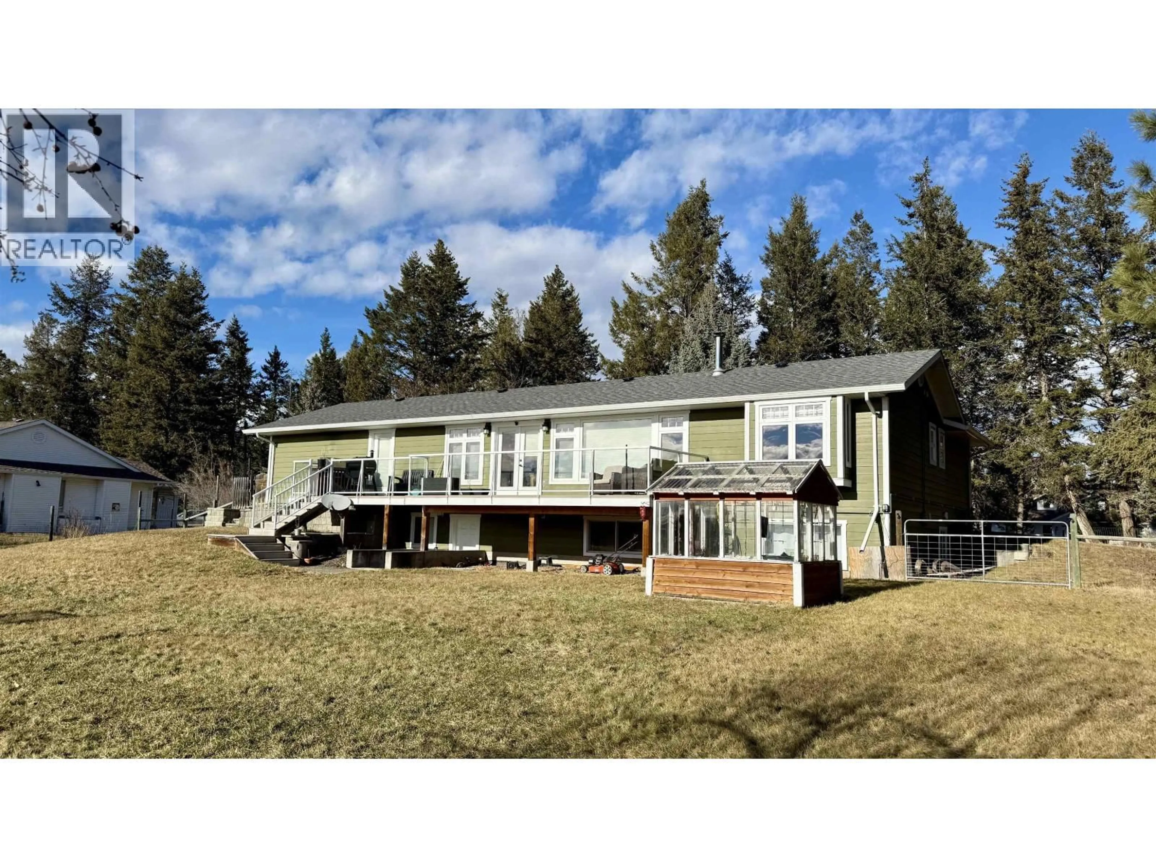 A pic from outside/outdoor area/front of a property/back of a property/a pic from drone, unknown for 5450 DONSLEEQUA COURT, 108 Mile Ranch British Columbia V0K2Z0