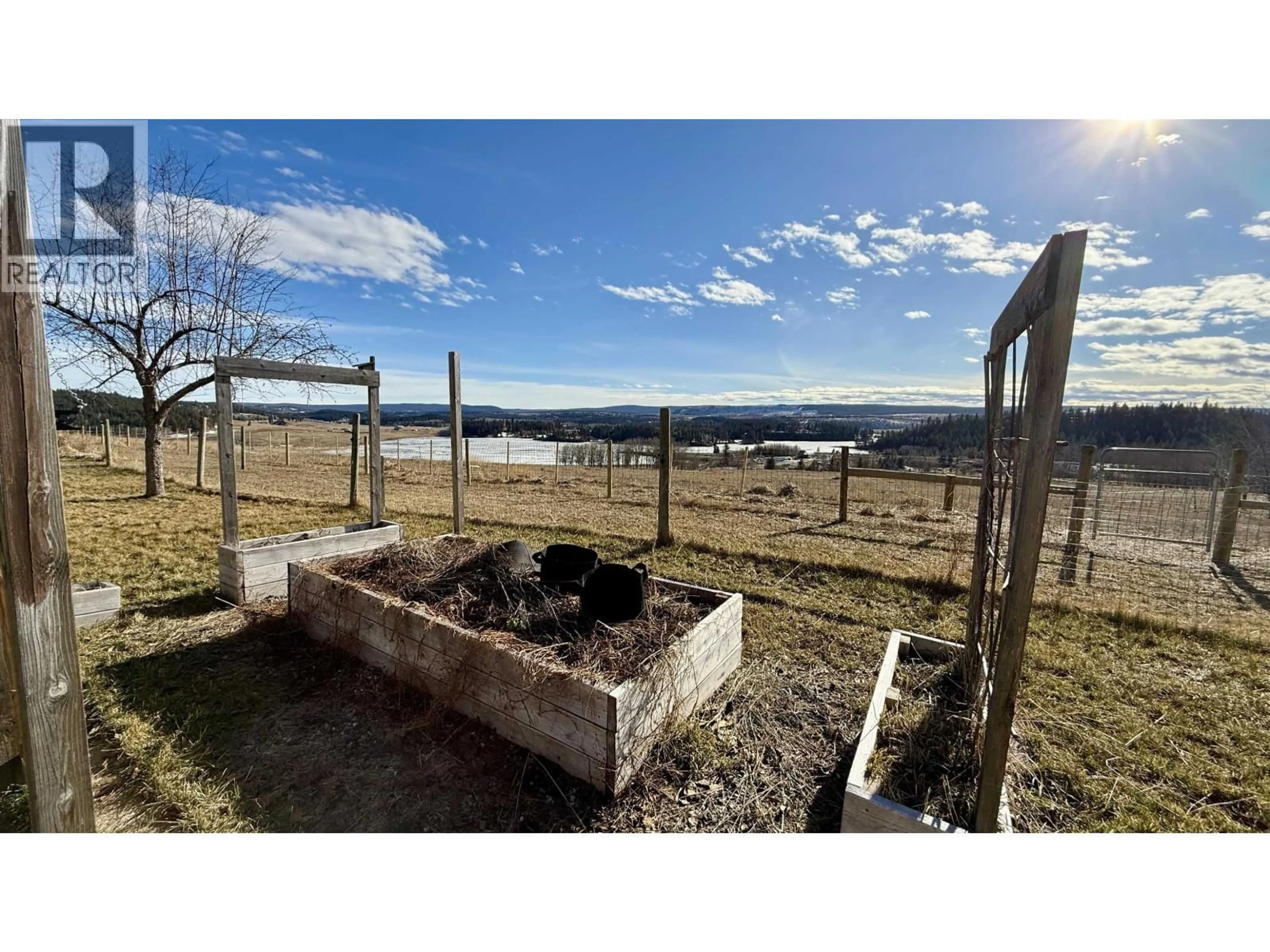 A pic from outside/outdoor area/front of a property/back of a property/a pic from drone, mountain view for 5450 DONSLEEQUA COURT, 108 Mile Ranch British Columbia V0K2Z0