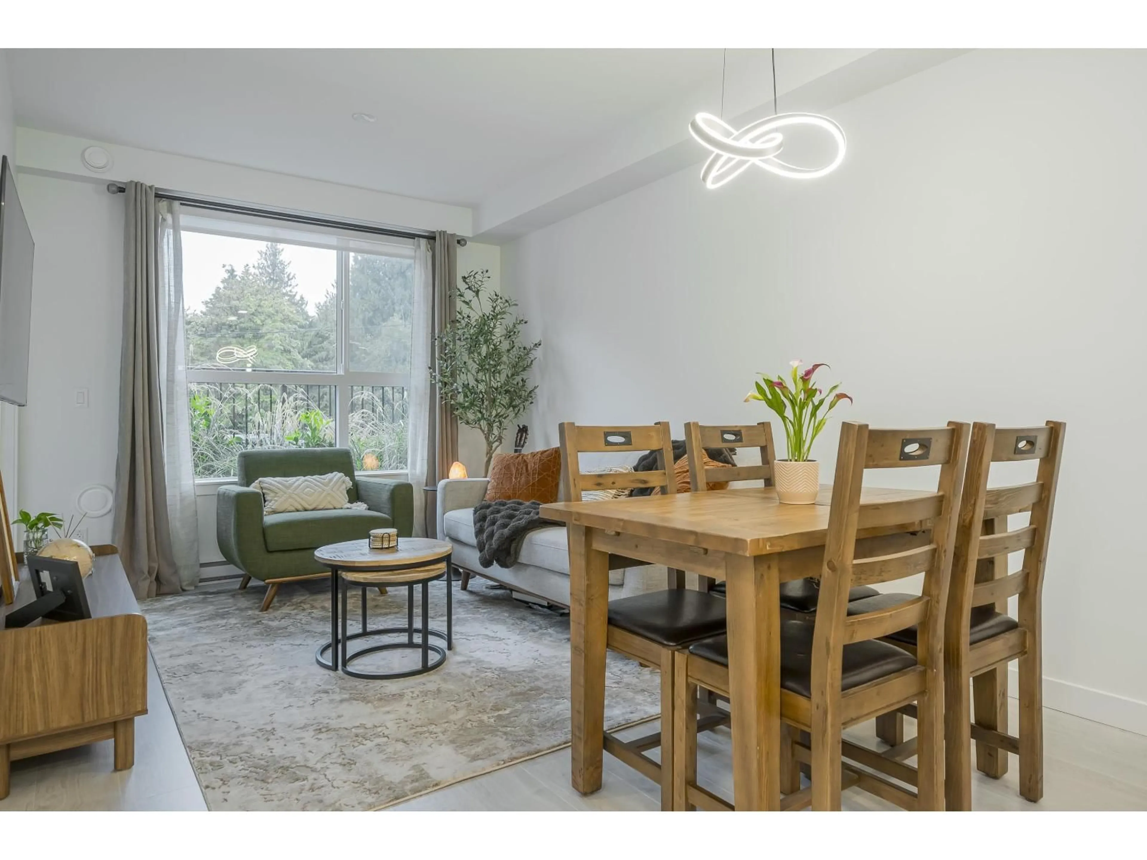 Dining room, wood/laminate floor for 106 - 5504 BRYDON, Langley British Columbia V3A0R3
