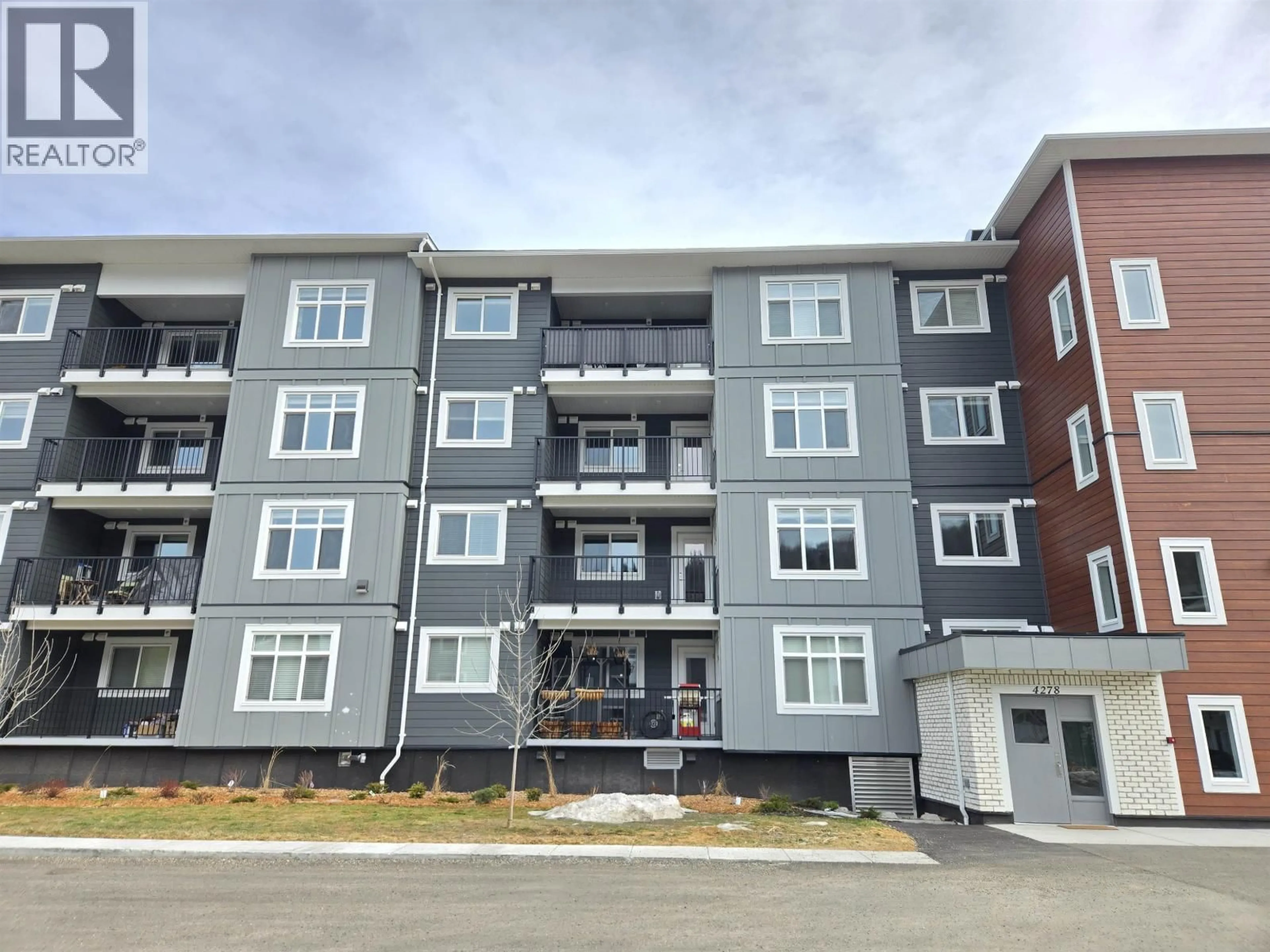 A pic from outside/outdoor area/front of a property/back of a property/a pic from drone, building for 103 - 4278 22ND AVENUE, Prince George British Columbia V2N0J4