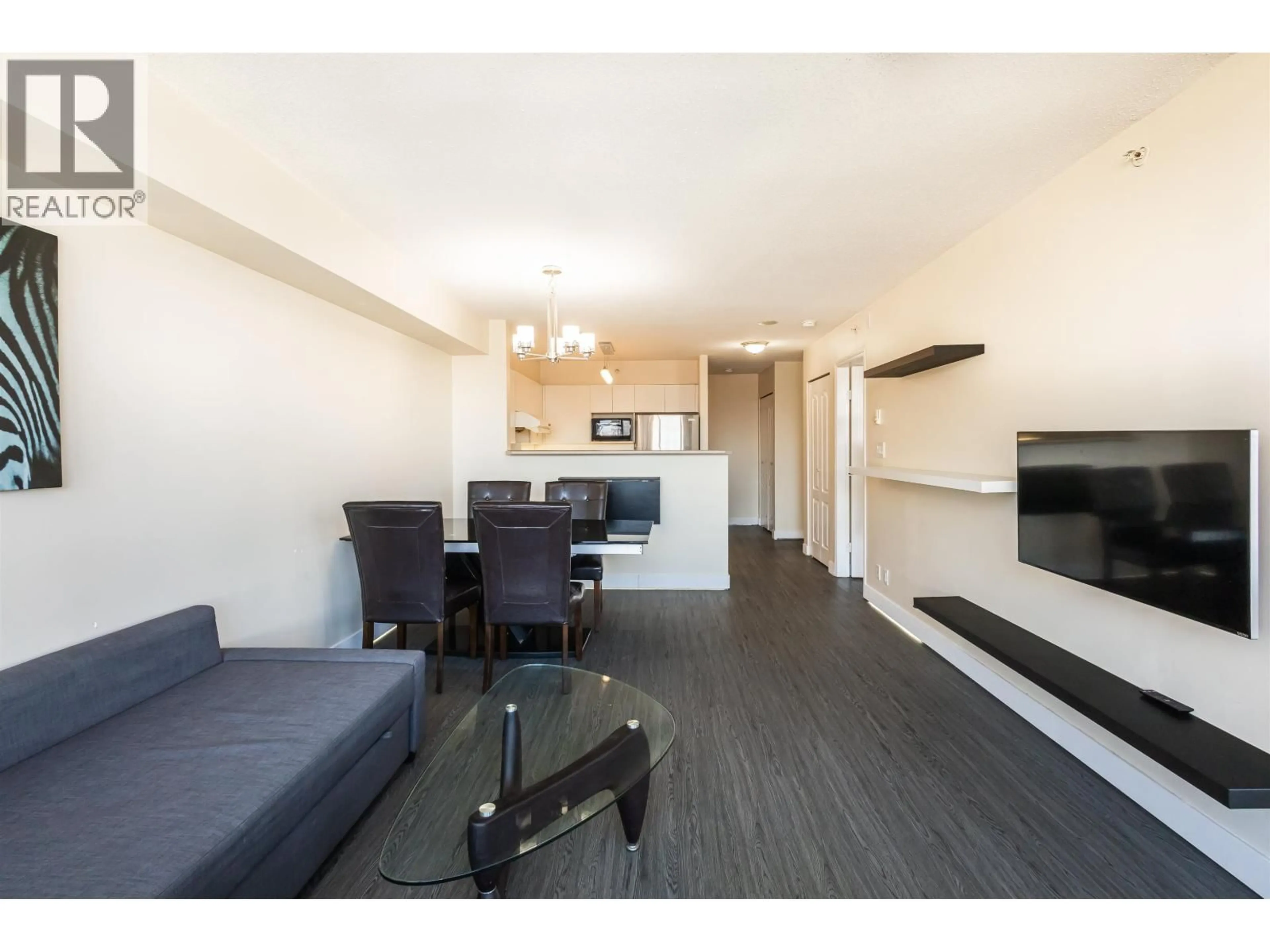 Living room with furniture, wood/laminate floor for 908 - 8297 SABA ROAD, Richmond British Columbia V6Y4B5