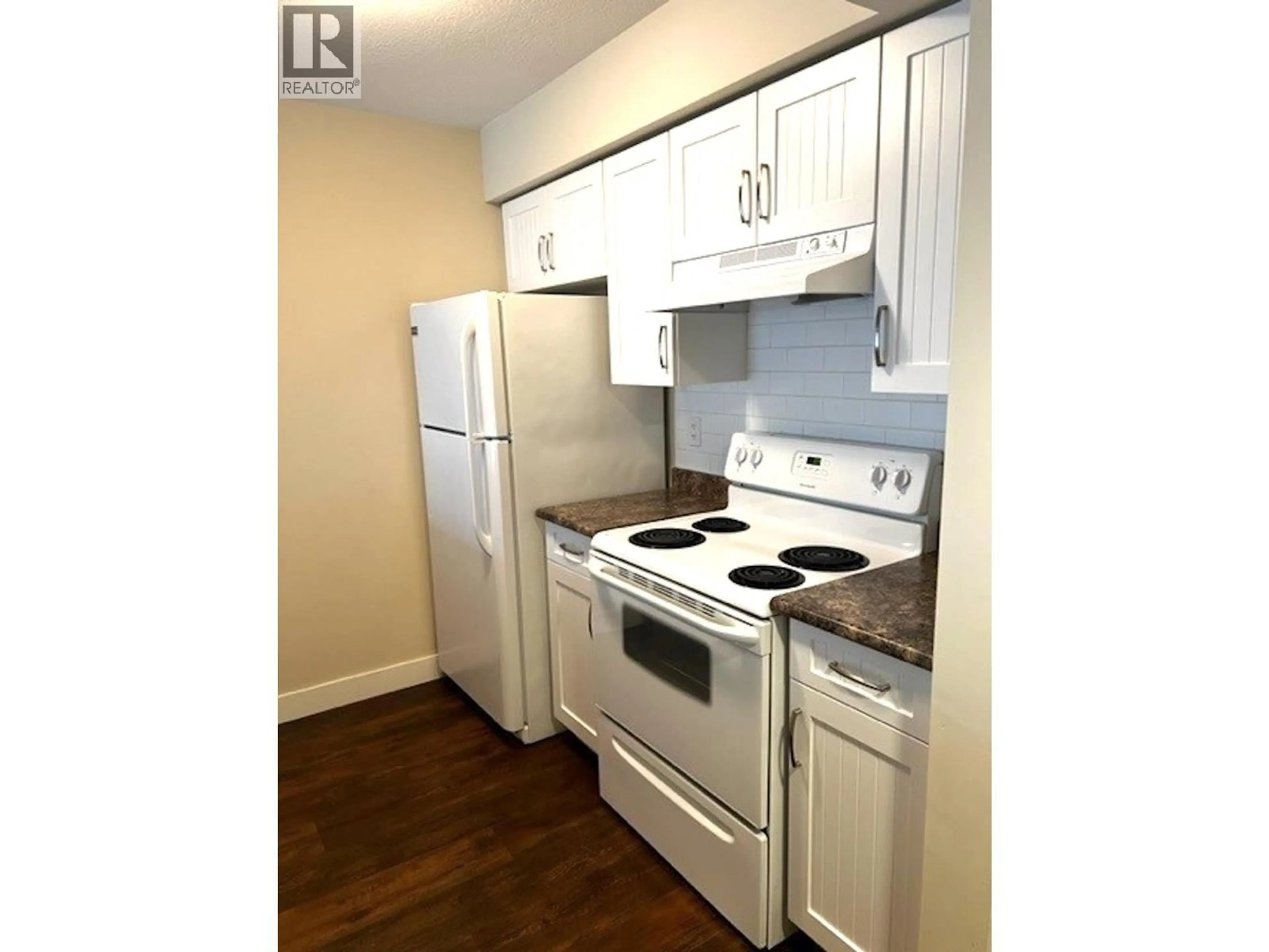 Standard kitchen, wood/laminate floor for 107 - 11004 102 AVENUE, Fort St. John British Columbia V1J0L9