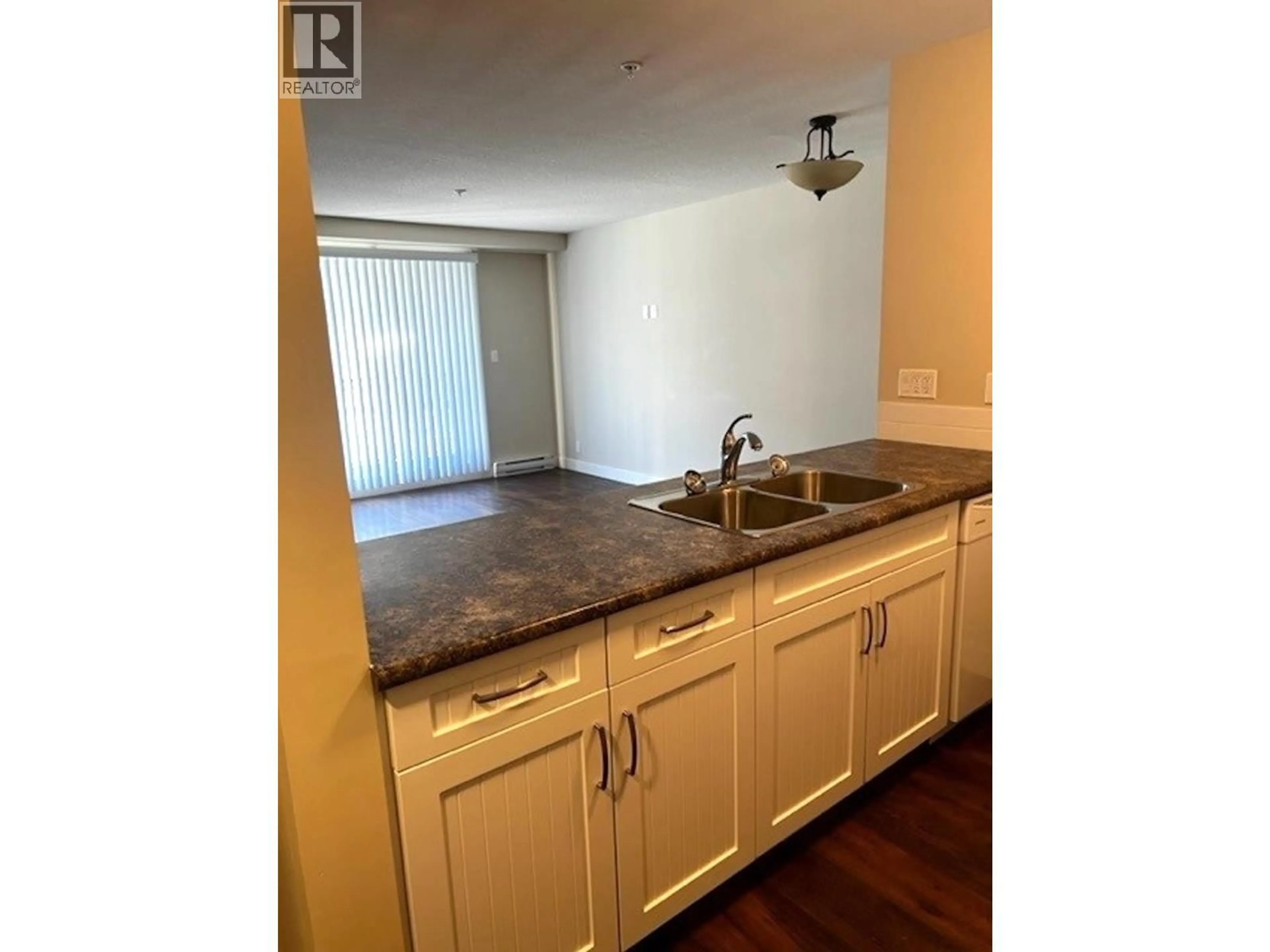Standard kitchen, wood/laminate floor for 107 - 11004 102 AVENUE, Fort St. John British Columbia V1J0L9